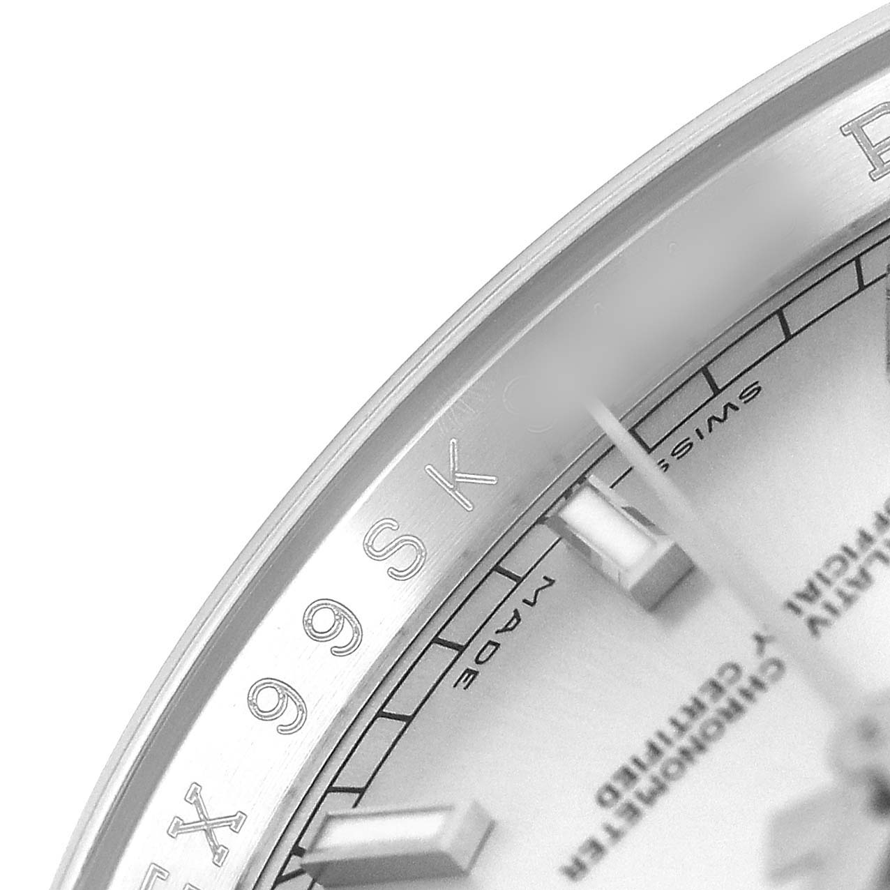 The image shows a close-up of the Rolex Datejust 116200 Men's Stainless Steel Silver Dial watch, focusing on the dial and part of the bezel.