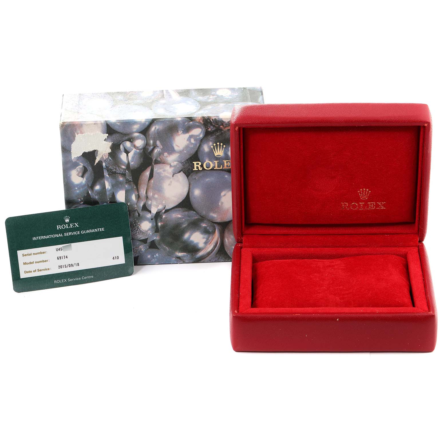 The image shows a red Rolex box, an international service guarantee card, and a decorative box for a Rolex Datejust 69174 Women's Stainless Steel Mother of Pearl Dial 69174 Women's Stainless Steel Mother of Pearl Dial model.