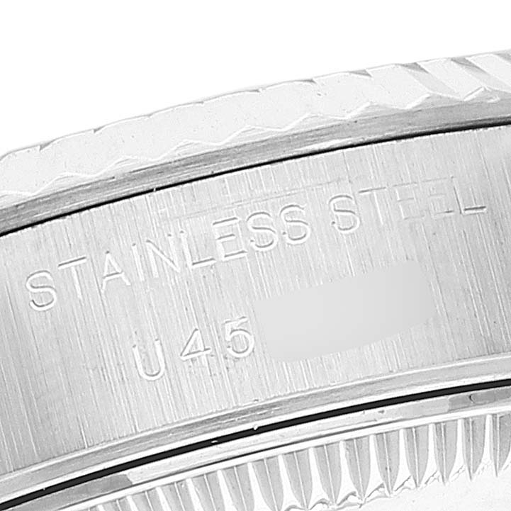 The image shows a close-up of the stainless steel part and engraving of the Rolex Datejust 69174 Women's Stainless Steel Mother of Pearl Dial 69174 Women's Stainless Steel Mother of Pearl Dial watch.