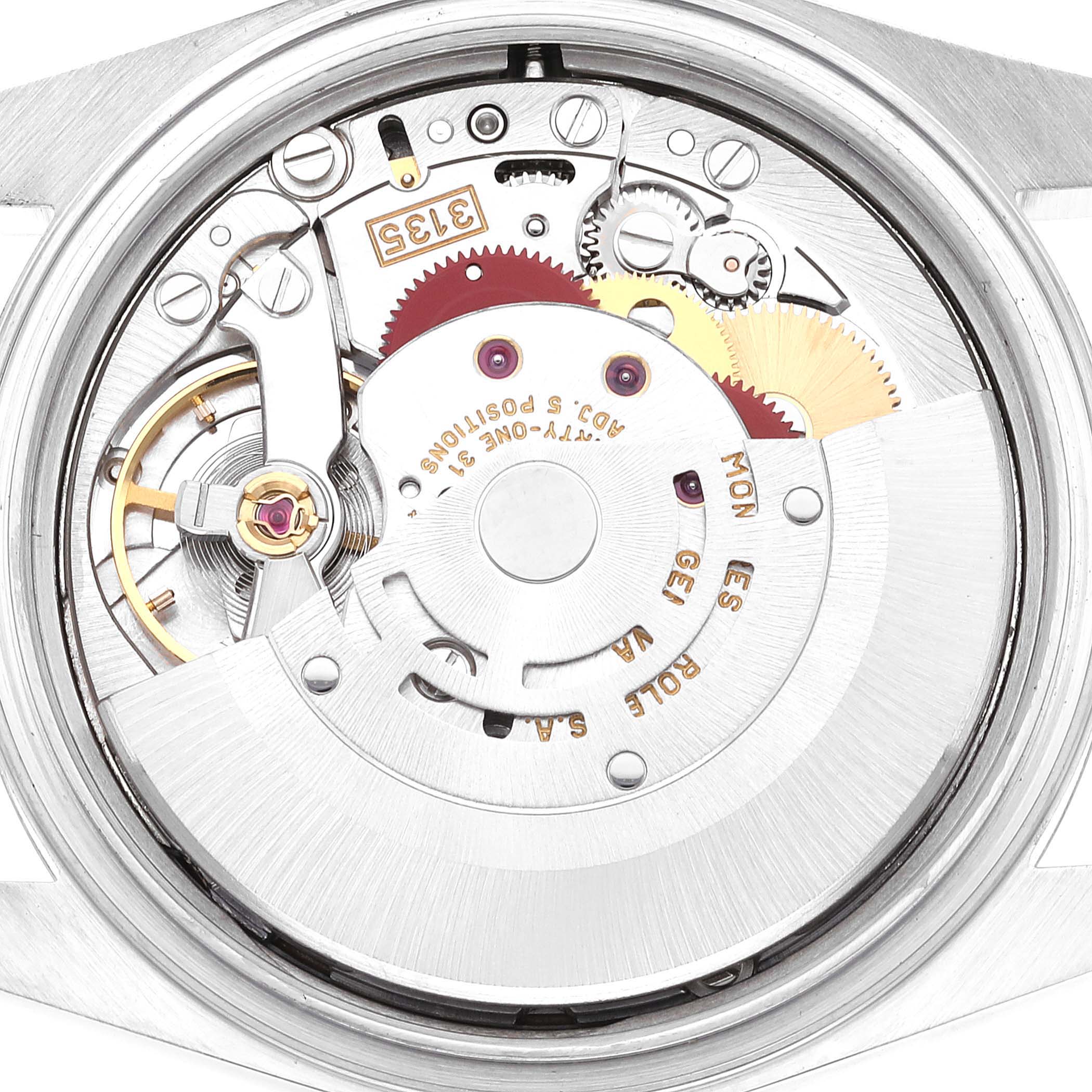 This image shows the internal mechanism of a Rolex Datejust 16234 Men's Stainless Steel Pink Dial 16234 Men's Stainless Steel Pink Dial watch from a rear angle, displaying gears and movements.