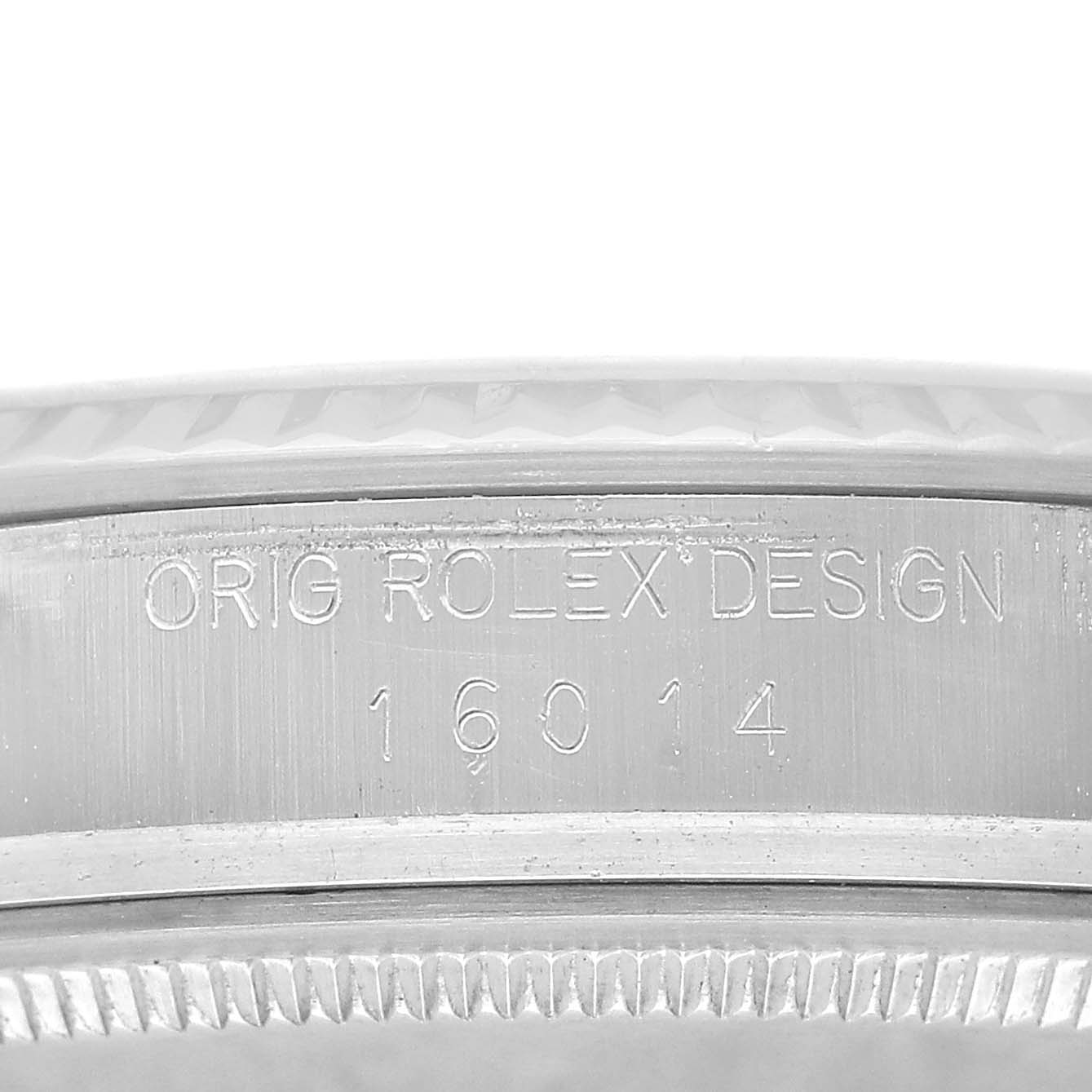 The image shows a close-up of the side of a Vintage Collection Rolex, highlighting the model number "16014" and "ORIG ROLEX DESIGN" engraving.