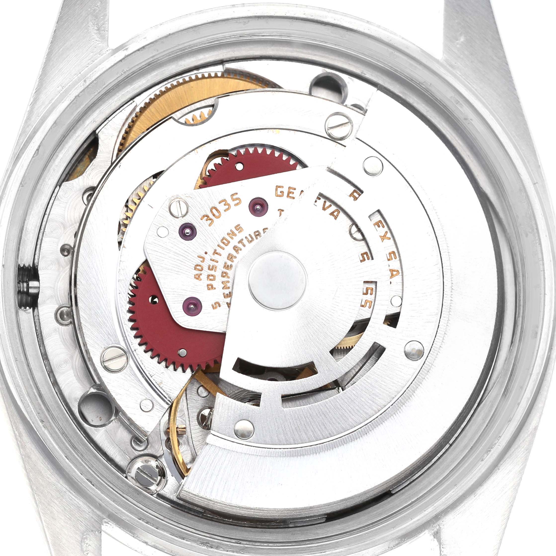 The image shows the movement mechanism of a Rolex Vintage Collection 16014 Men's Stainless Steel Silver Dial watch, viewed from the back.