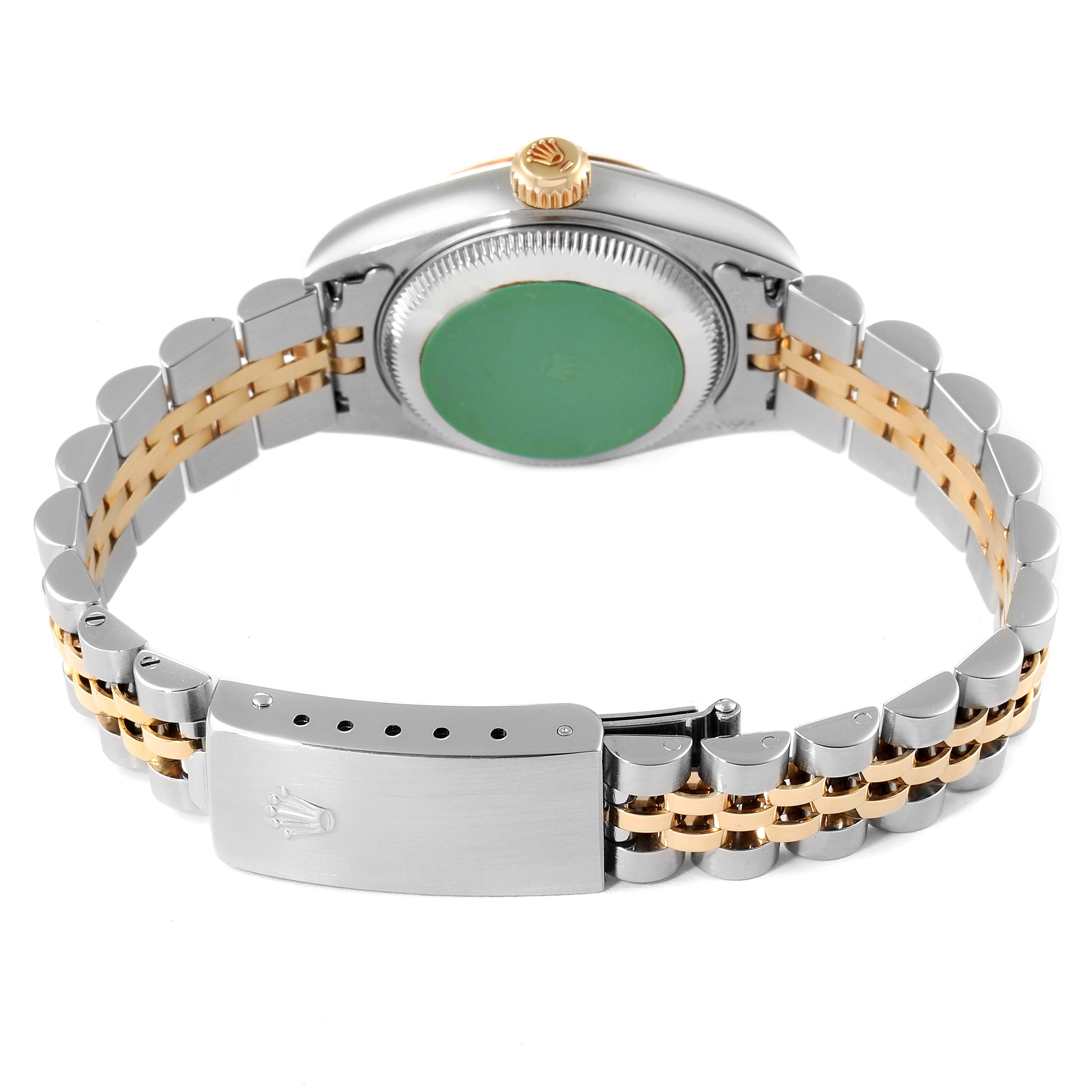 The image shows the back of a Rolex Datejust 79173 Women
s Steel and Gold (two tone) Mother of Pearl Dial 79173 Women
s Steel and Gold (two tone) Mother of Pearl Dial watch, highlighting the clasp and part of the bracelet.