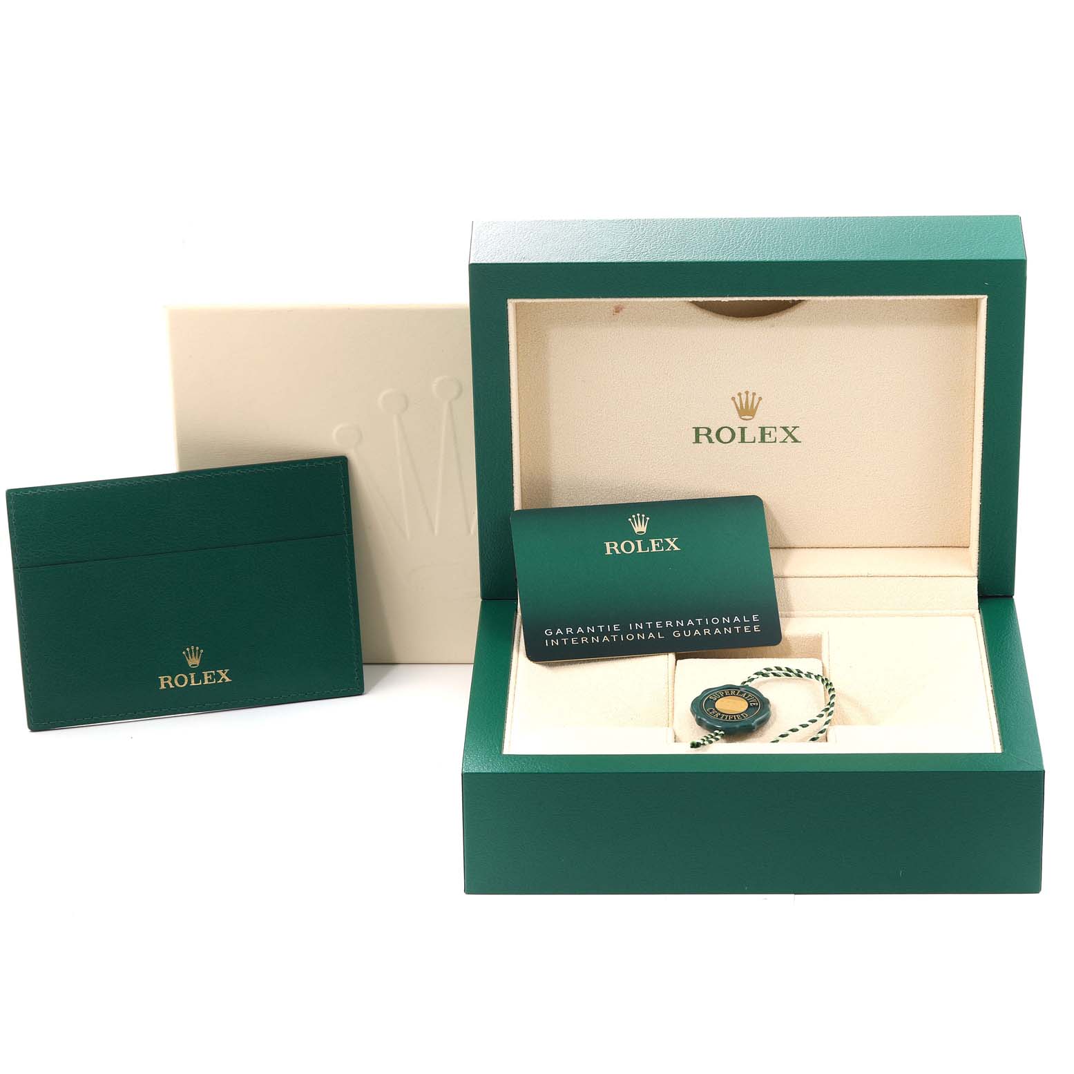 This image shows the packaging, international guarantee card, and tags for the Rolex Datejust 126283 Men's Steel and Gold (two tone) Champagne Dial 126283 Men's Steel and Gold (two tone) Champagne Dial model.