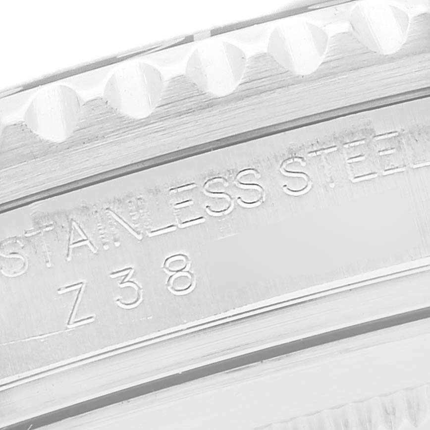 This image shows a close-up angle of the engraving on the bezel of a Rolex GMT-Master 16710 Men
s Stainless Steel Black Dial 16710 Men
s Stainless Steel Black Dial, displaying "STAINLESS STEEL Z38."
