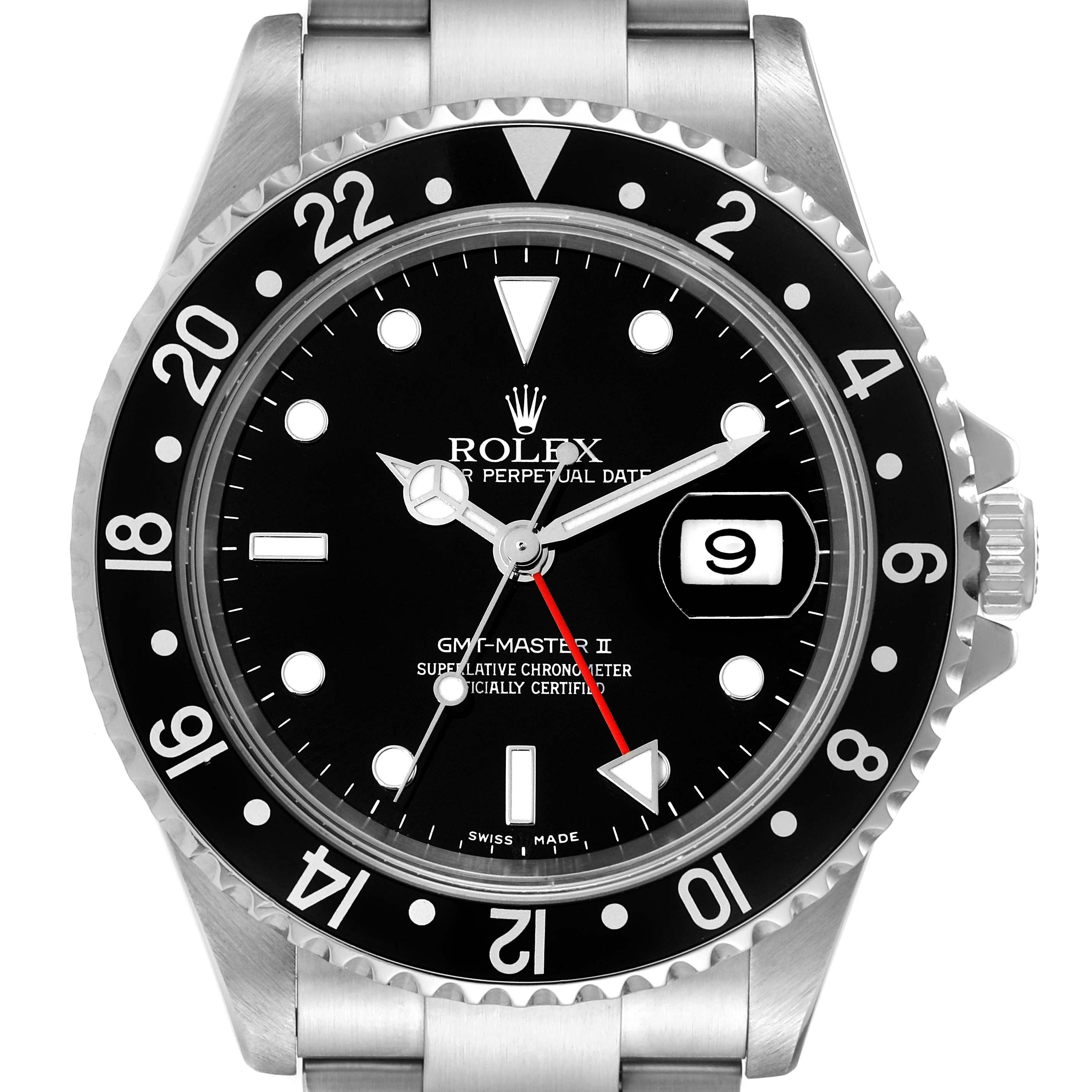 The image shows a frontal view of the Rolex GMT-Master 16710 Men
s Stainless Steel Black Dial 16710 Men
s Stainless Steel Black Dial II watch, including its bezel, dial, hands, and date window.