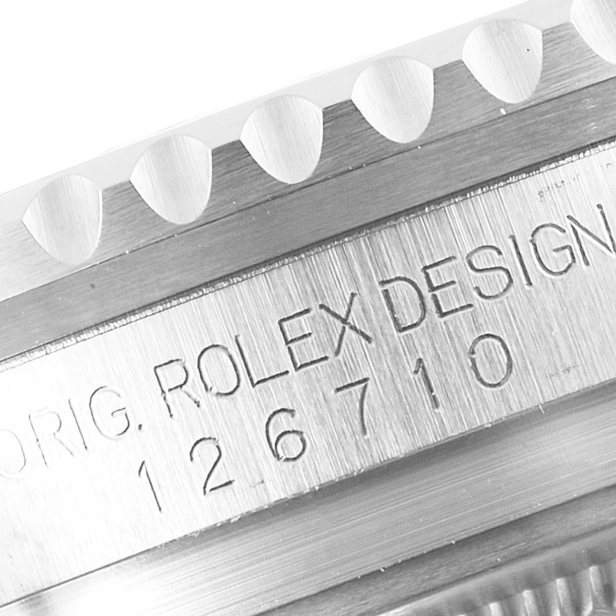 The image shows a close-up of the side of the Rolex GMT-Master 126710 Men's Stainless Steel Black Dial 126710 Men's Stainless Steel Black Dial watch, highlighting the model number.