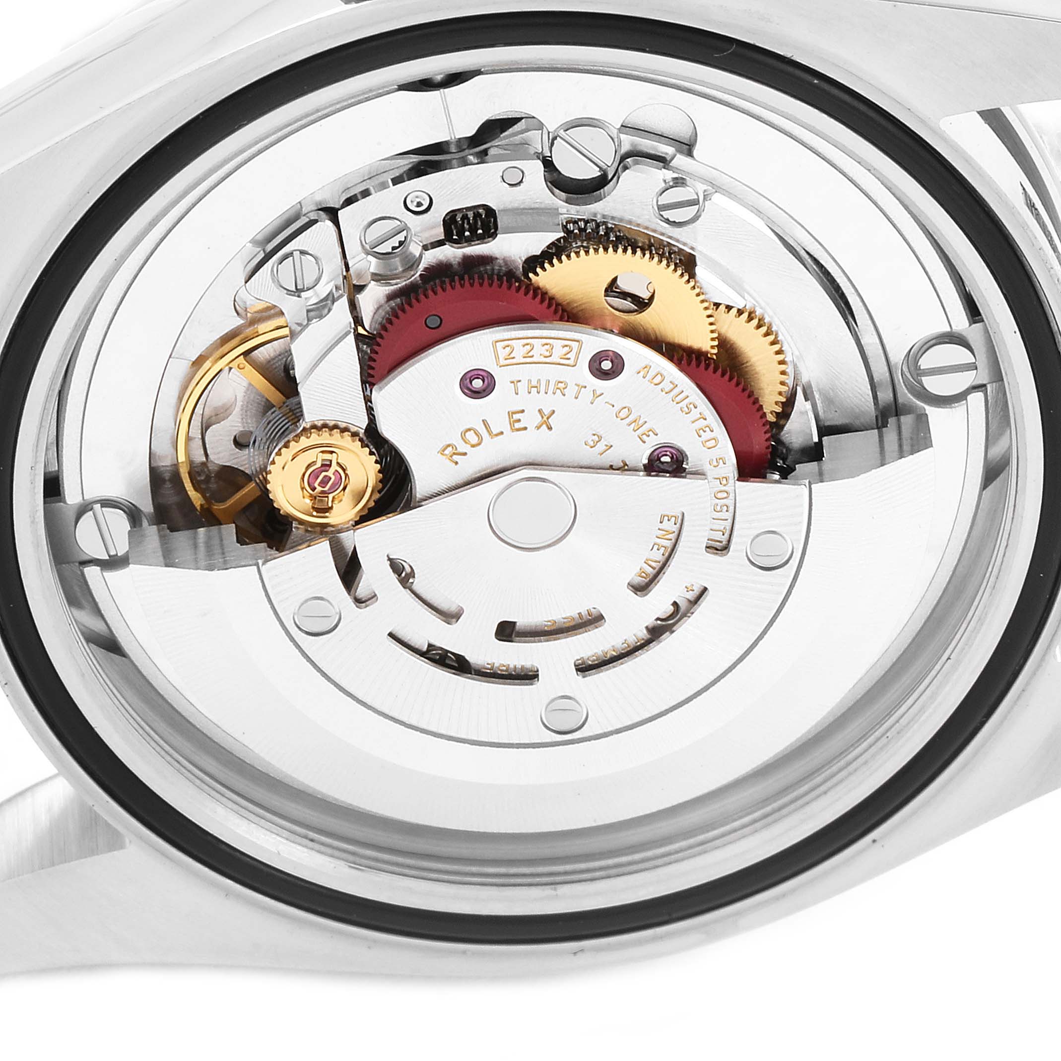The image shows the intricate internal mechanism of a Rolex Oyster Perpetual 124200 Men's Stainless Steel Silver Dial 124200 Men's Stainless Steel Silver Dial watch from the back view.