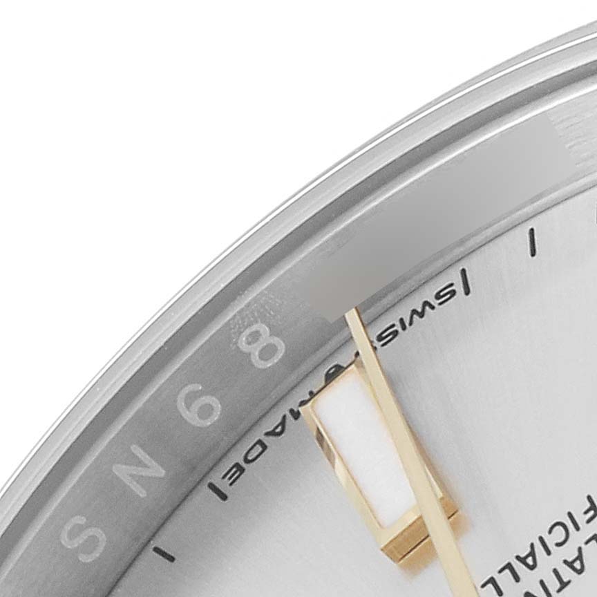 The image shows a partial view of the dial and minute hand of a Rolex Oyster Perpetual 124200 Men's Stainless Steel Silver Dial 124200 Men's Stainless Steel Silver Dial watch.