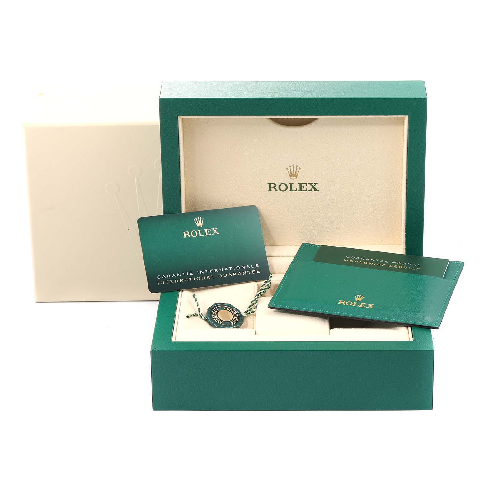 The image shows the packaging, warranty, manual, and tags for a Rolex Oyster Perpetual 126000 Men's Stainless Steel Silver Dial 126000 Men's Stainless Steel Silver Dial watch.