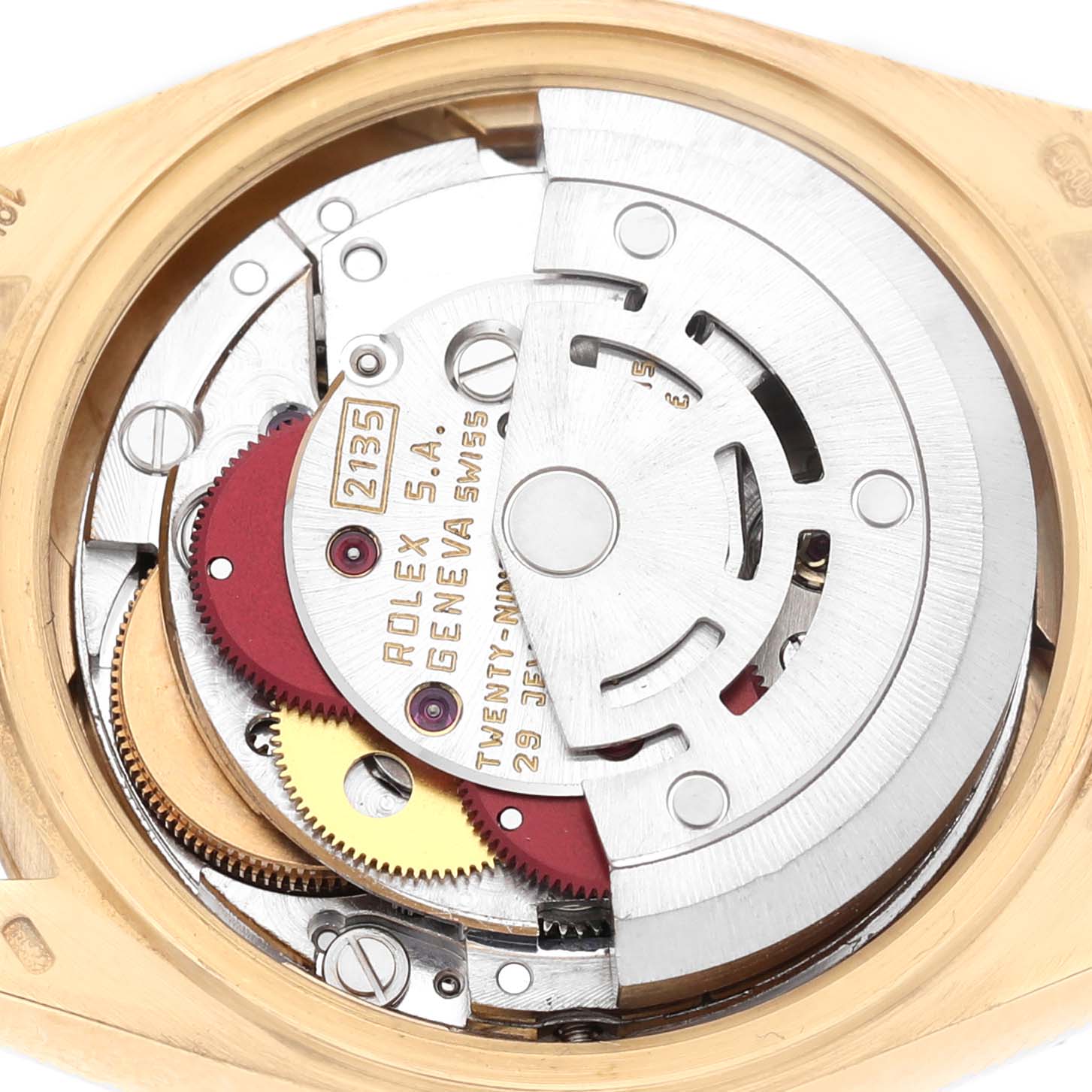 The image shows the movement inside a Rolex President 69178 Women's Yellow Gold Champagne Dial model, showcasing gears and mechanisms from a rear angle.