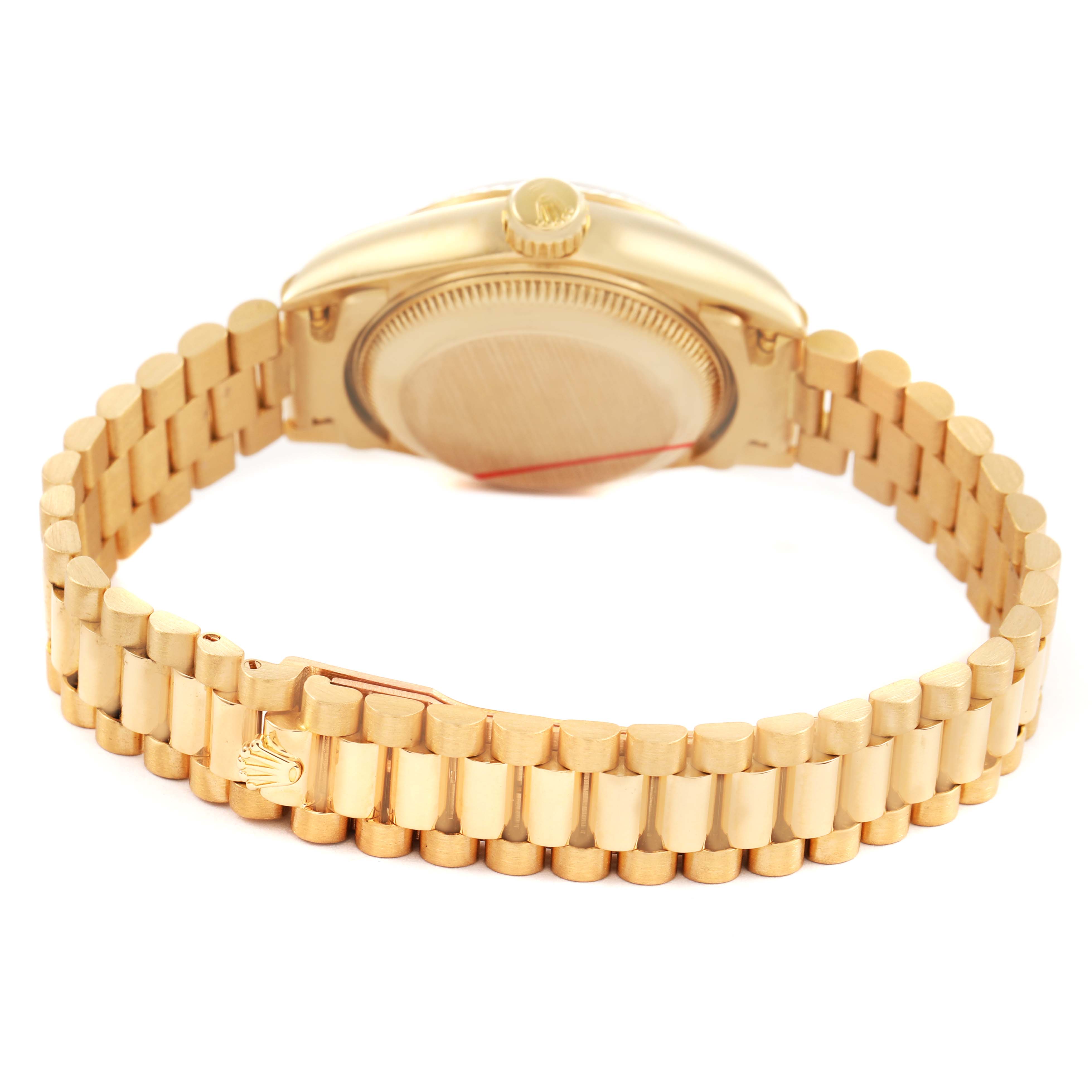 The image shows the back and bracelet of the Rolex President 69178 Women's Yellow Gold Champagne Dial model from a slightly elevated angle.