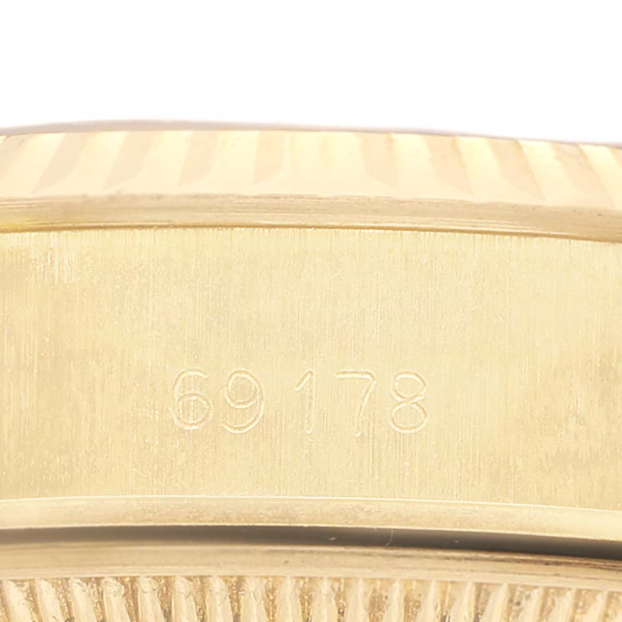 The image shows a close-up of the side of a Rolex President 69178 Women's Yellow Gold Champagne Dial watch case, highlighting the model number engraving.