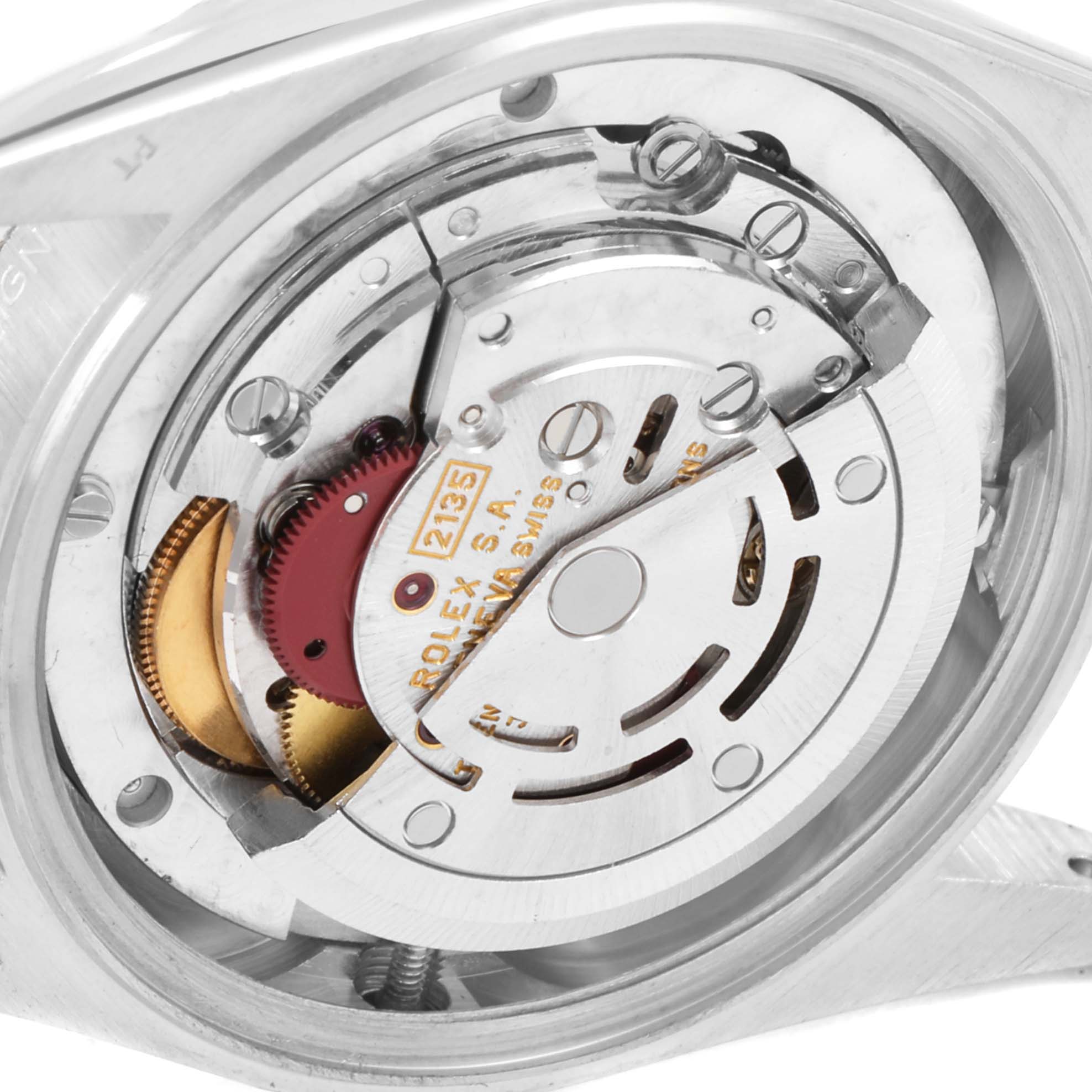 This image shows an internal view of the Rolex President 68286 Women's Platinum Silver Dial 68286 Women's Platinum Silver Dial model, highlighting its exposed mechanical movement.