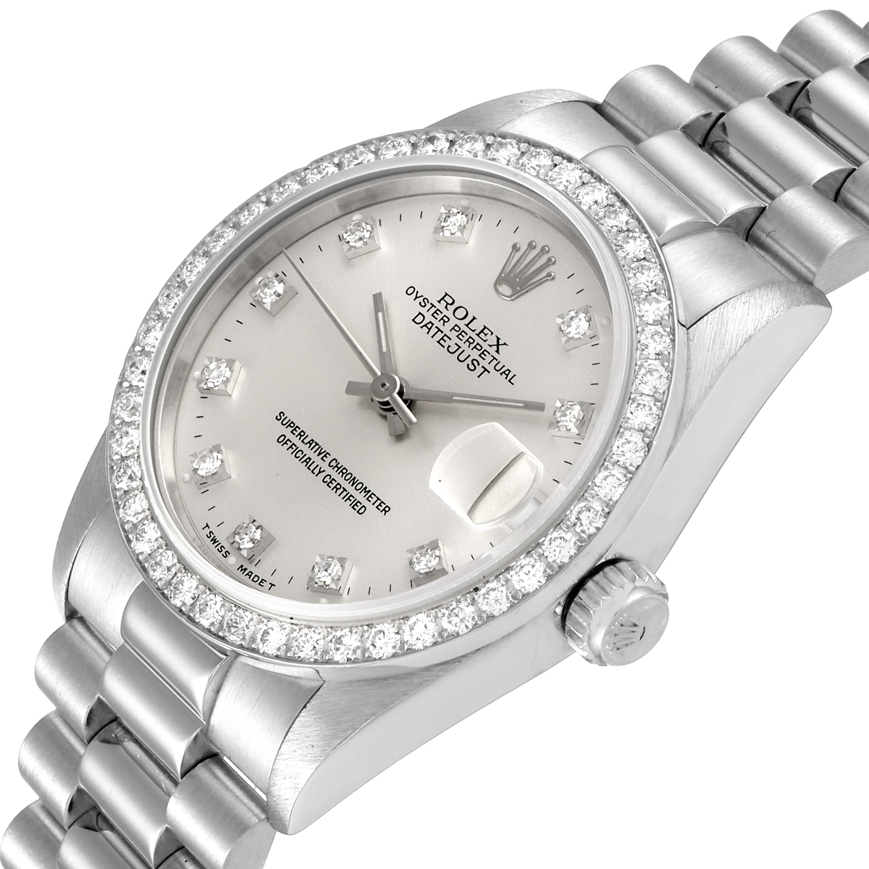 The image shows a Rolex President 68286 Women's Platinum Silver Dial 68286 Women's Platinum Silver Dial watch featuring a silver dial, diamond bezel, and oyster bracelet from a slight angle.