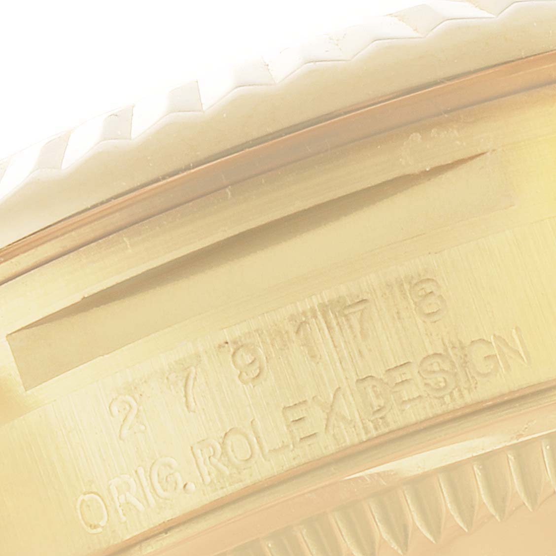 This image shows a close-up angle of the case side and serial number engraving on a Rolex President 279178 Women
s Yellow Gold Champagne Dial 279178 Women
s Yellow Gold Champagne Dial model watch.