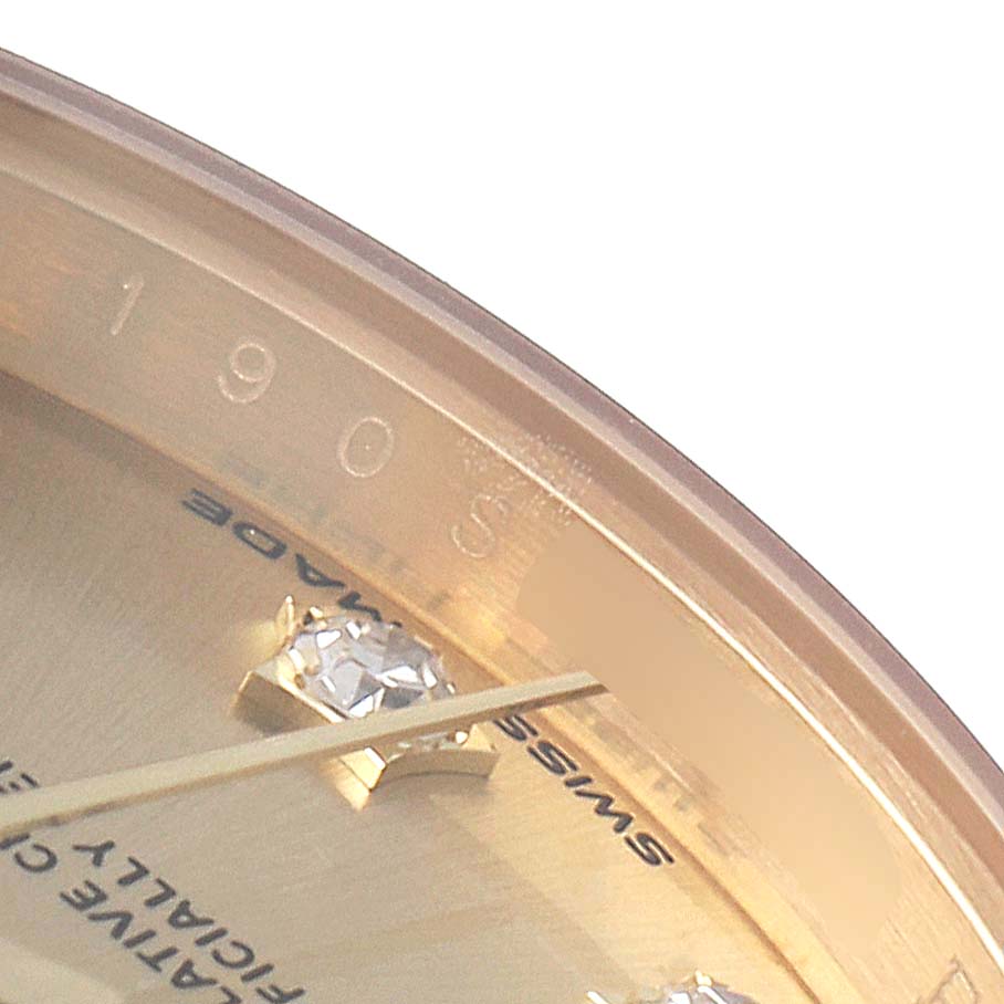 This close-up image of a Rolex President 279178 Women
s Yellow Gold Champagne Dial 279178 Women
s Yellow Gold Champagne Dial watch shows the dial with a diamond marker and part of the bezel with "1905" and "Swiss Made" visible.
