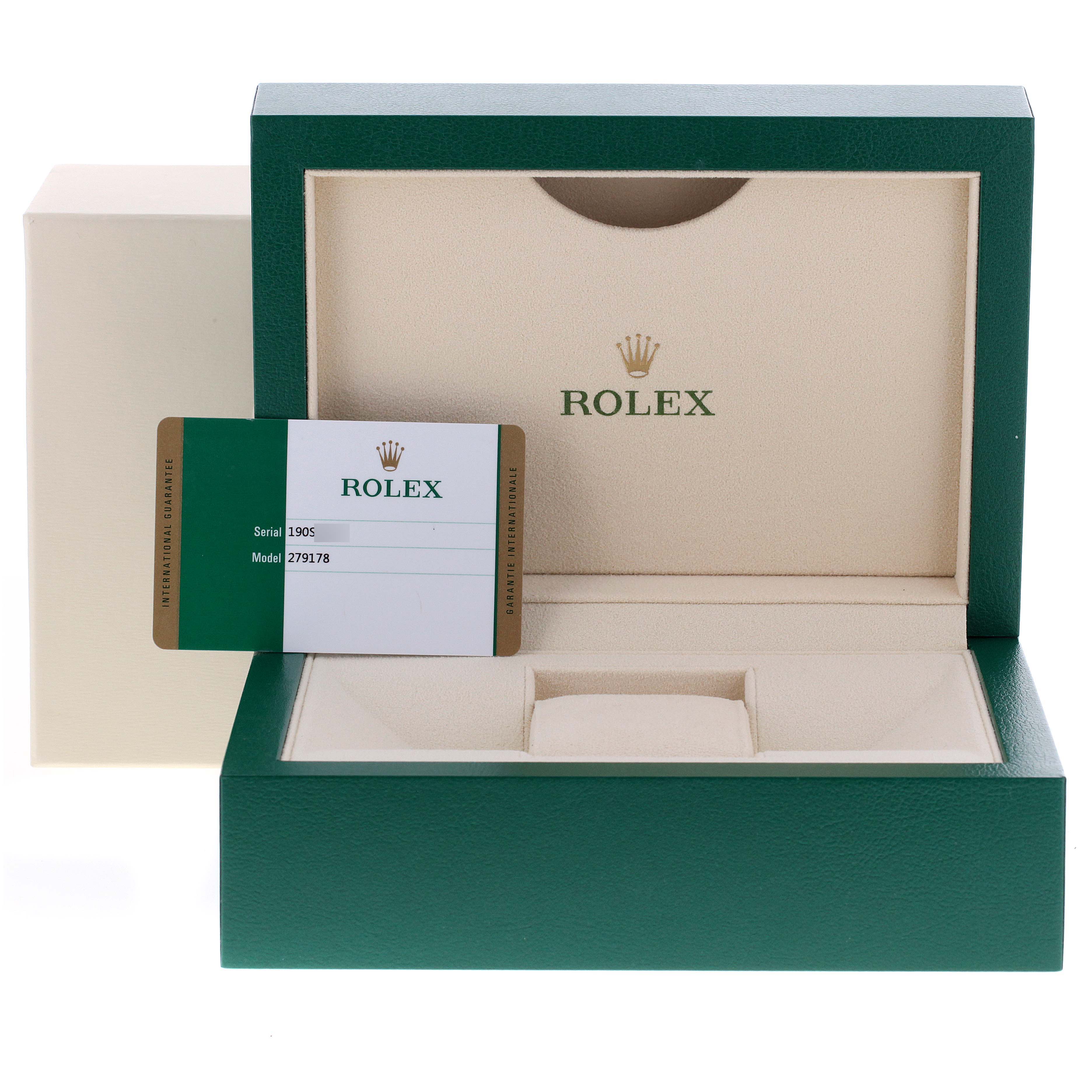 This image displays the open box and warranty card for a Rolex President 279178 Women
s Yellow Gold Champagne Dial 279178 Women
s Yellow Gold Champagne Dial model watch.