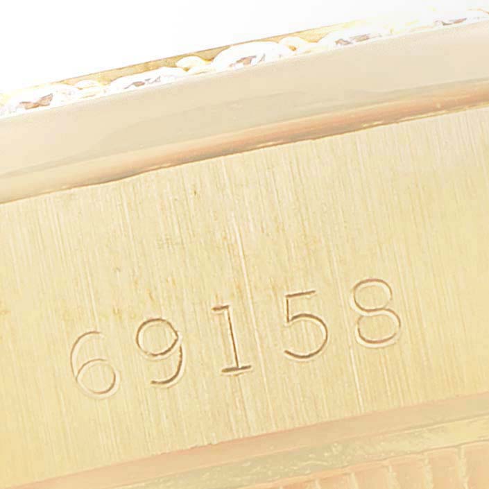 This image shows a close-up angle of the case with model number 69158 on the Rolex President 69158 Women
s Yellow Gold Champagne Dial 69158 Women
s Yellow Gold Champagne Dial watch.