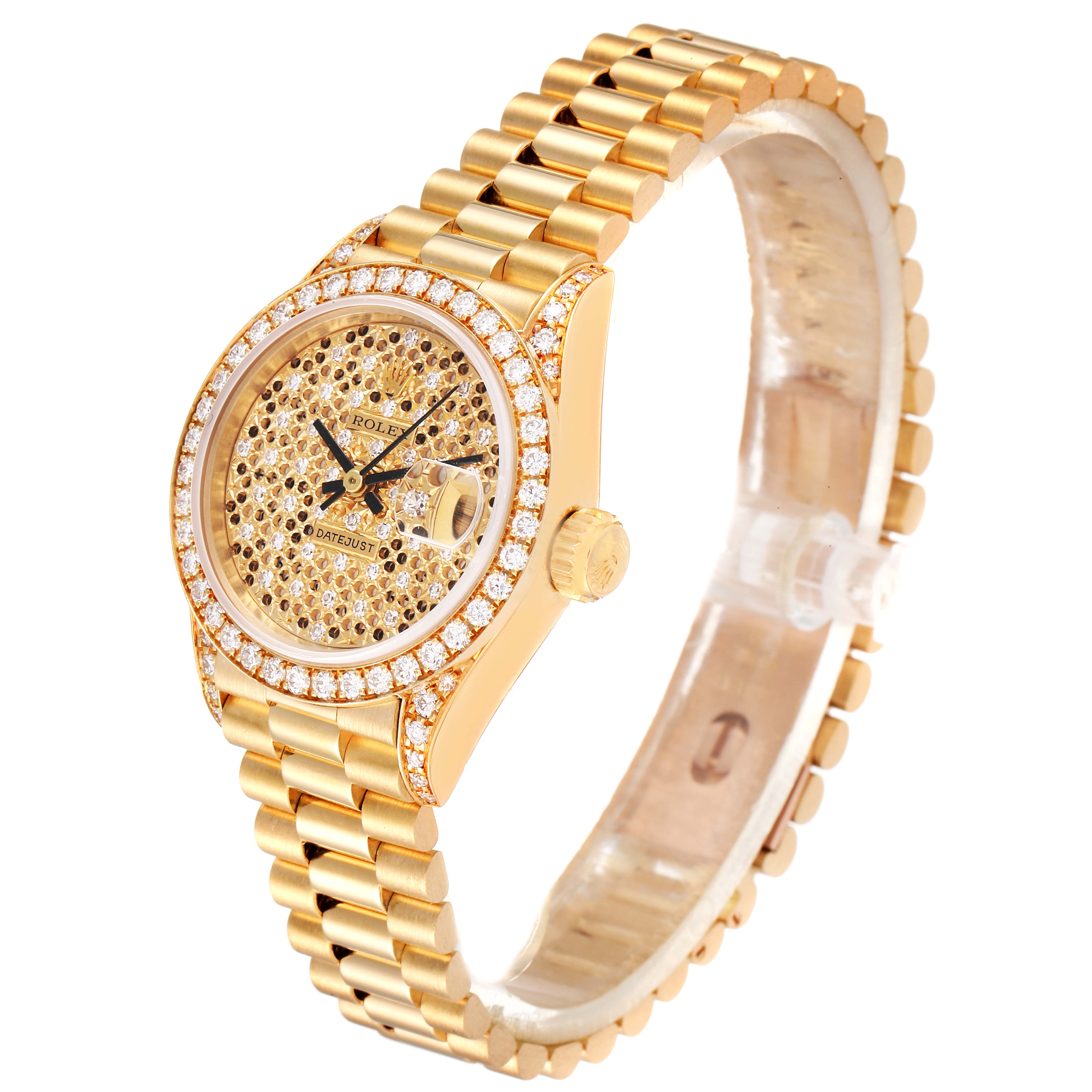 The image shows a Rolex President 69158 Women
s Yellow Gold Champagne Dial 69158 Women
s Yellow Gold Champagne Dial model watch at a slight angle, highlighting its gold bracelet, diamond bezel, and detailed dial.