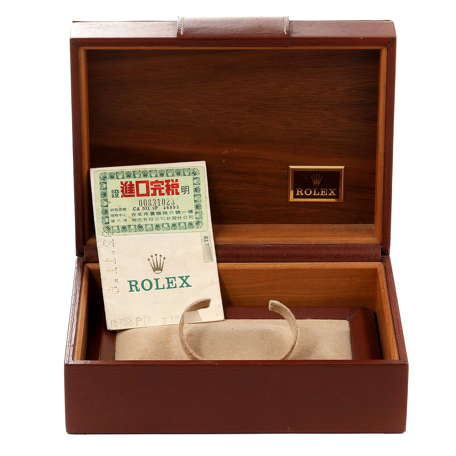 The image shows an open Rolex President 18388 Men
s Yellow Gold Champagne Dial 18388 Men
s Yellow Gold Champagne Dial watch box with a warranty card and cushion inside.