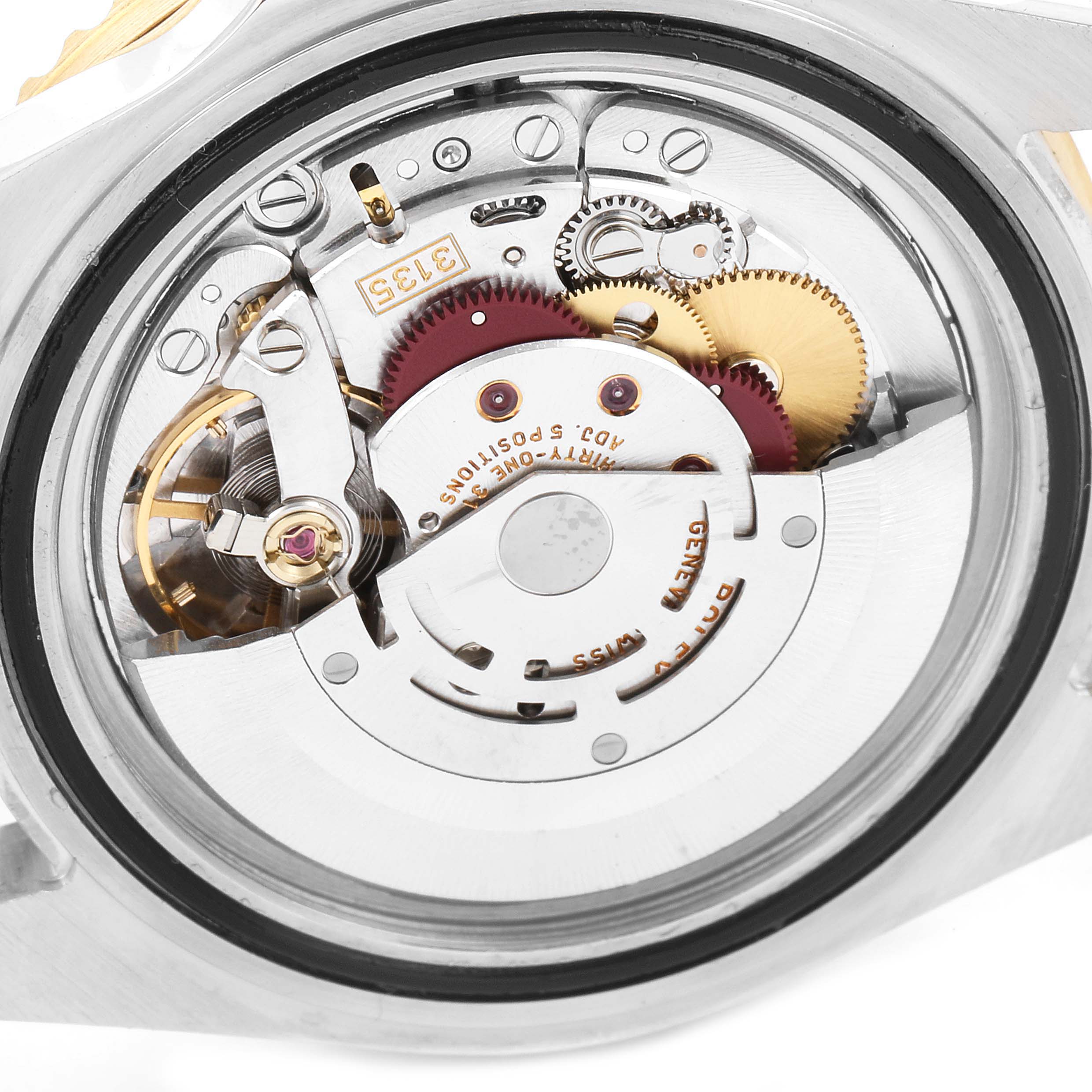 This image shows the internal mechanism and movement of a Rolex Submariner 16613 Men's Steel and Gold (two tone) Blue Dial 16613 Men's Steel and Gold (two tone) Blue Dial watch.