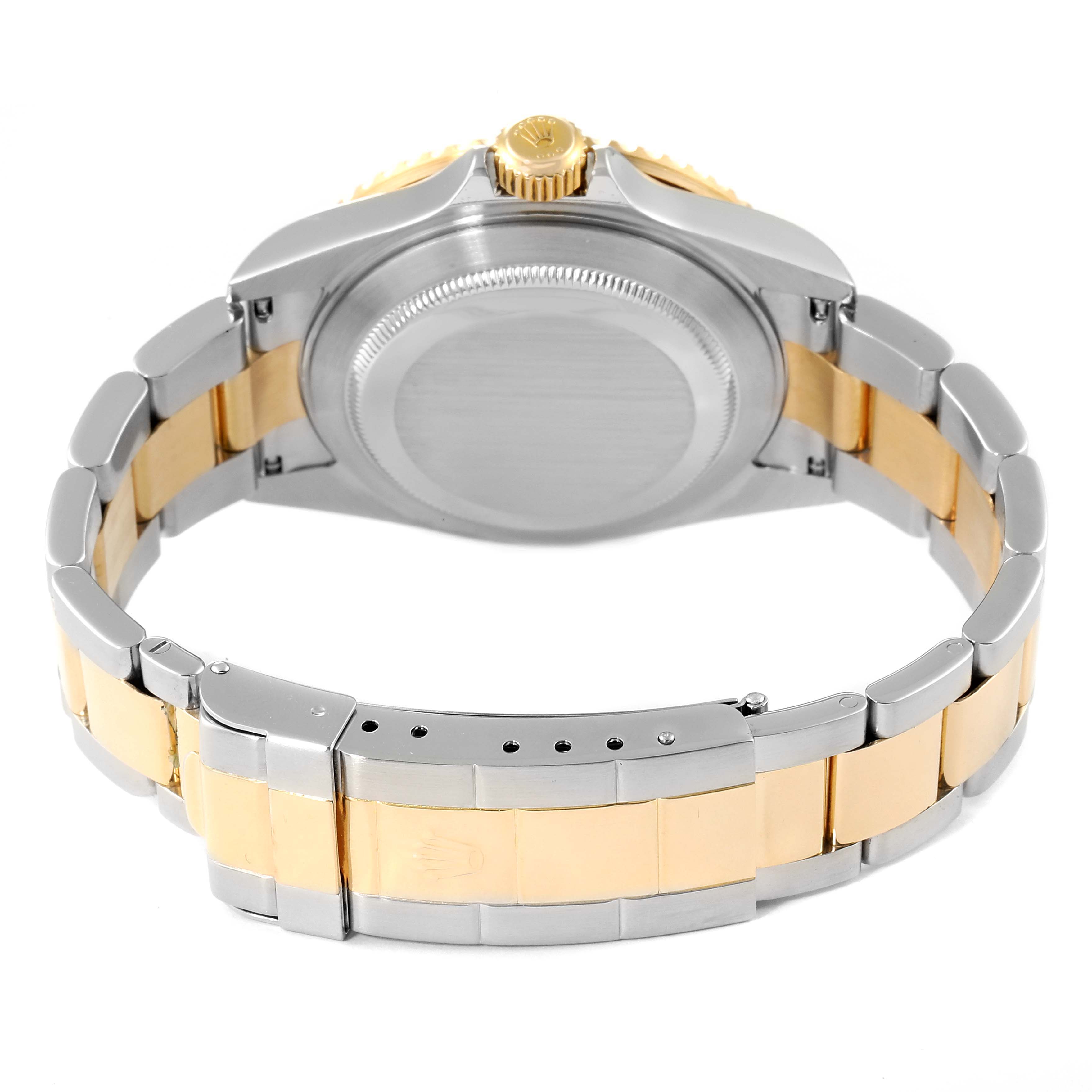 This image shows the back view of a Rolex Submariner 16613 Men's Steel and Gold (two tone) Blue Dial 16613 Men's Steel and Gold (two tone) Blue Dial, including the case back and two-tone bracelet.