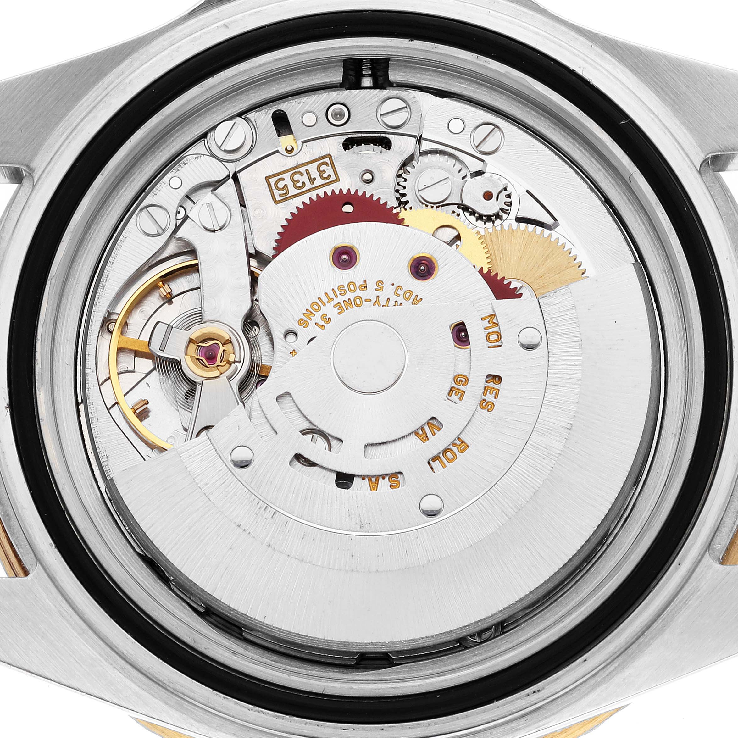 This image shows the internal mechanical movement of a Rolex Submariner 16613 Men's Steel and Gold (two tone) Blue Dial 16613 Men's Steel and Gold (two tone) Blue Dial watch from a back angle.