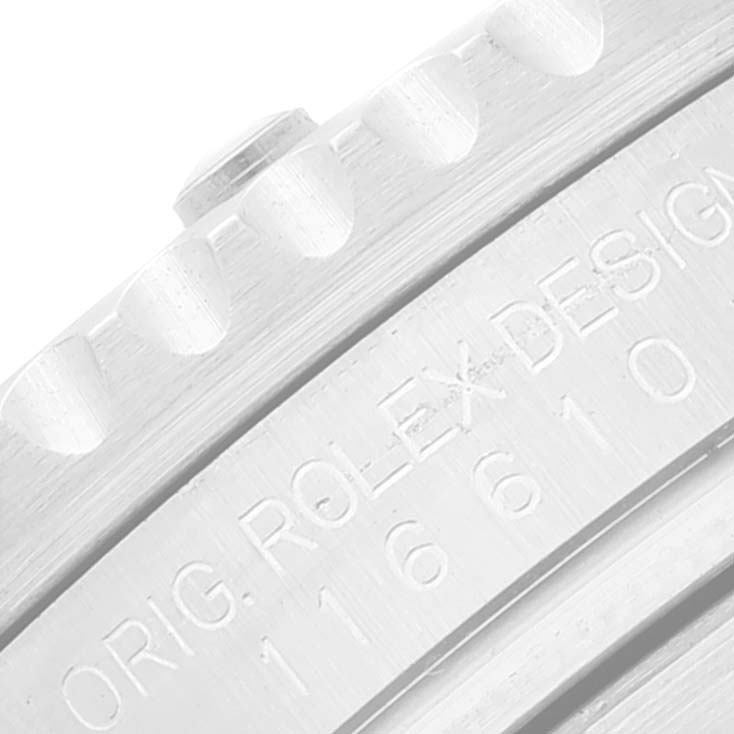 The image shows a close-up of the Rolex Submariner 116610LV Men
s Stainless Steel Green Dial 116610LV Men
s Stainless Steel Green Dial
s bezel and case, highlighting the engraved model number.