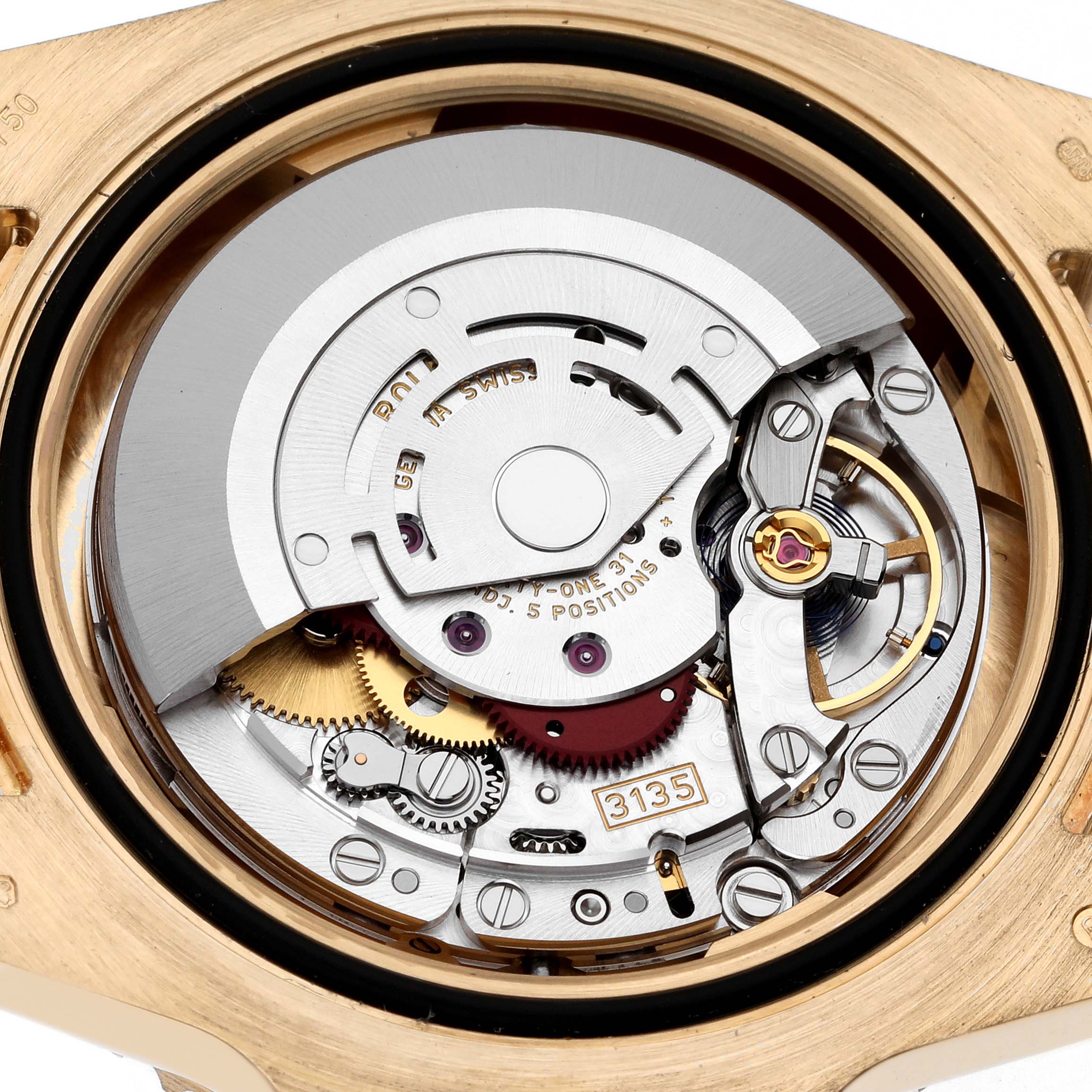 This image shows the internal movement mechanism of the Rolex Submariner 116618 Men's Yellow Gold Blue Dial 116618 Men's Yellow Gold Blue Dial watch, viewed from the back with parts like gears and the rotor visible.