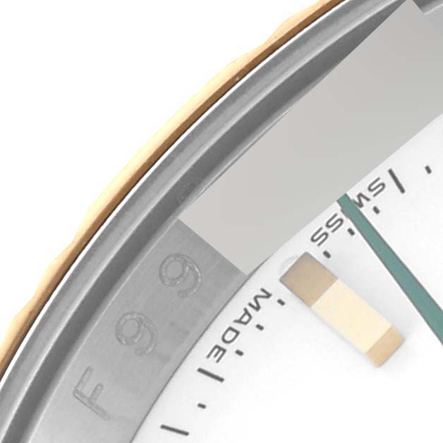 This image shows a close-up of the dial and bezel of a Rolex Turn-o-Graph 116263 Men's Steel and Gold (two tone) White Dial 116263 Men's Steel and Gold (two tone) White Dial watch.