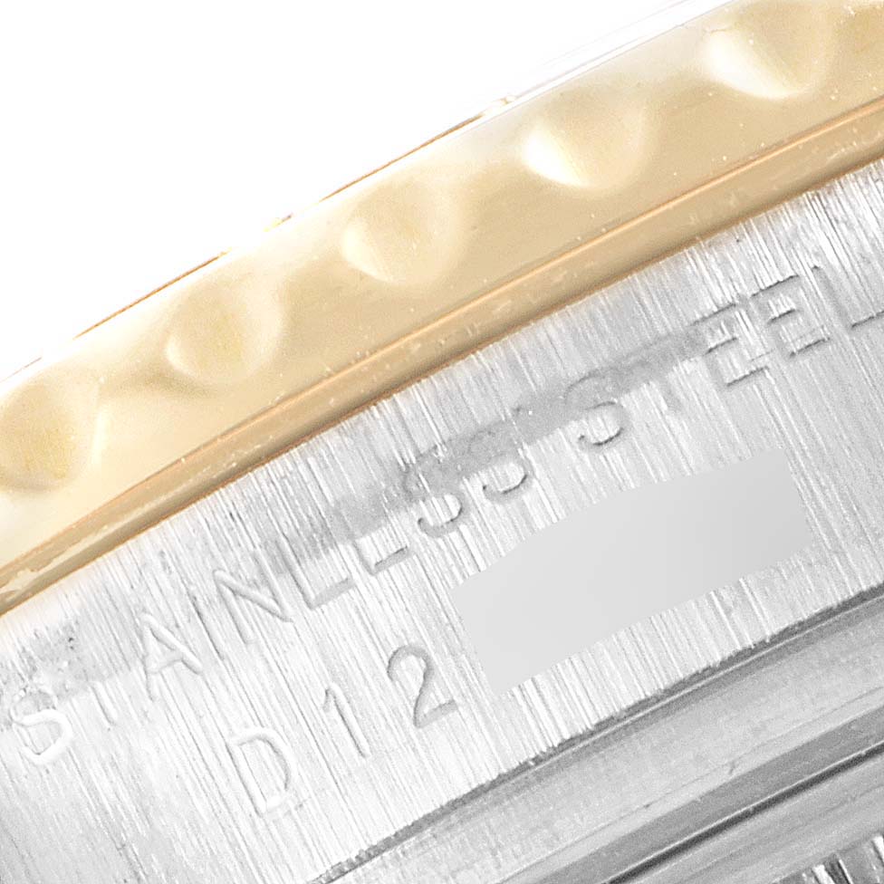 This close-up image shows the stainless steel bezel and engraved inscriptions on the Rolex Yacht-Master 169623 Women
s Steel and Gold (two tone) White Dial 169623 Women
s Steel and Gold (two tone) White Dial watch.