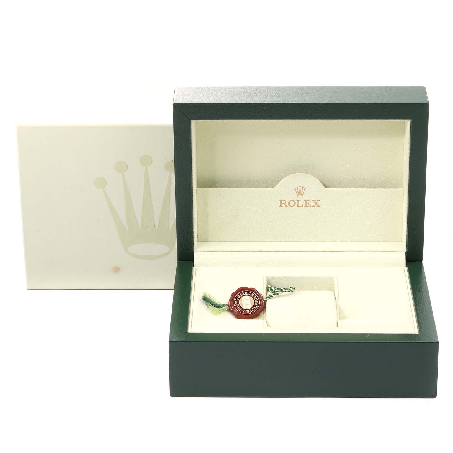 This image shows an open box for a Rolex Yacht-Master 16623 Men
s Steel and Gold (two tone) White Dial 16623 Men
s Steel and Gold (two tone) White Dial watch, displaying the interior compartments and a tag.