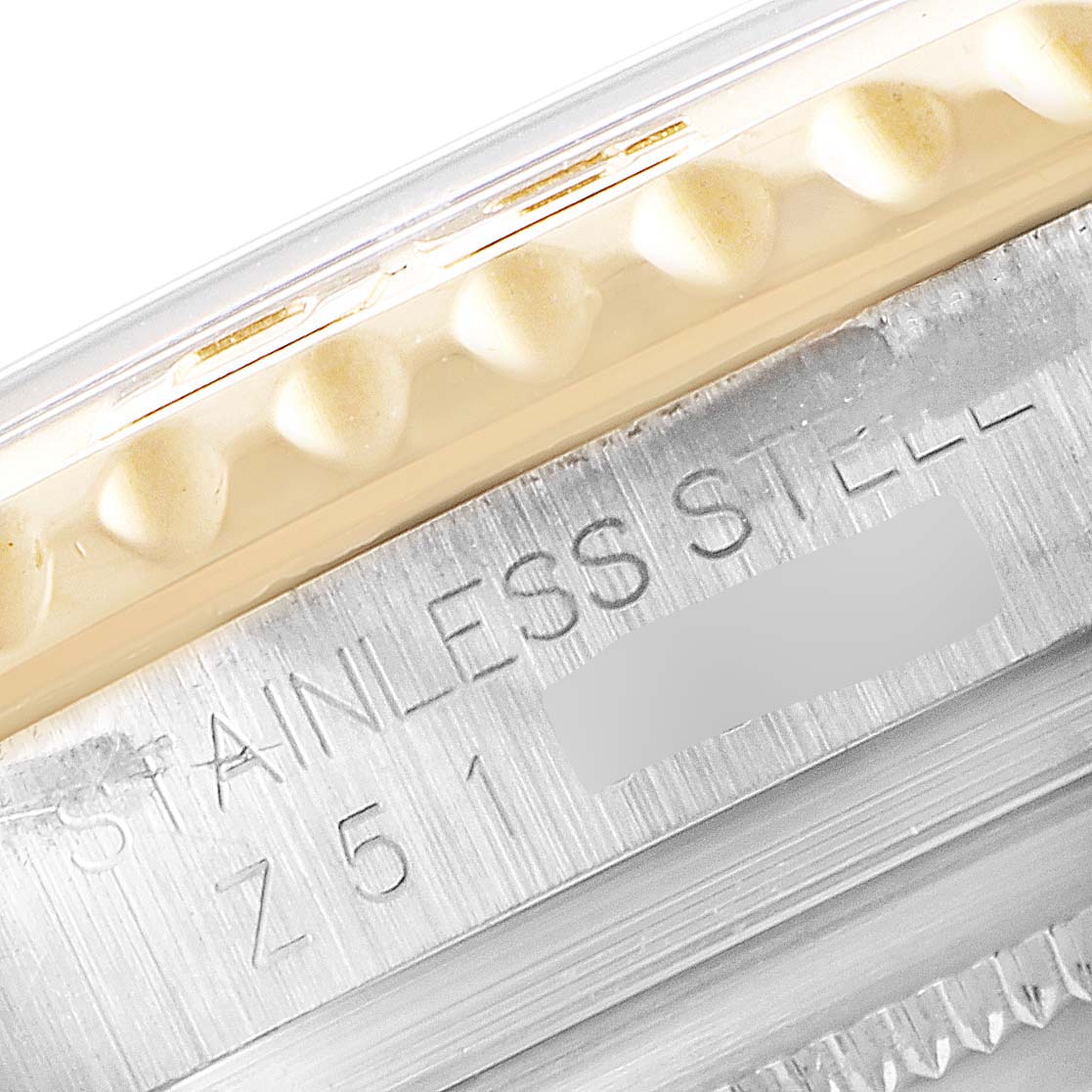 This image shows a close-up of the side case and bezel edge of a Rolex Yacht-Master 16623 Men
s Steel and Gold (two tone) White Dial 16623 Men
s Steel and Gold (two tone) White Dial watch.