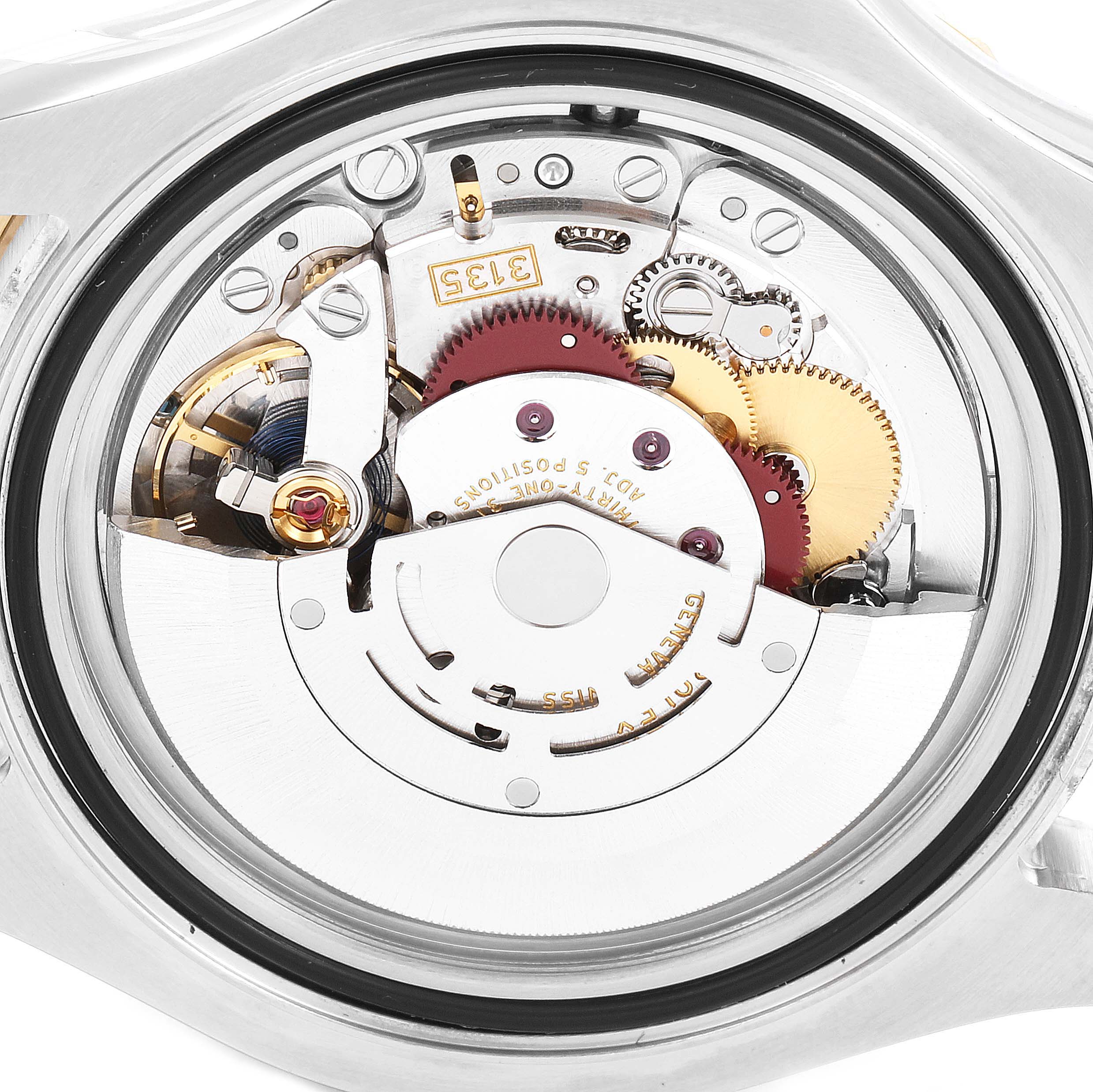 This image shows the movement mechanism of a Rolex Yacht-Master 16623 Men
s Steel and Gold (two tone) White Dial 16623 Men
s Steel and Gold (two tone) White Dial watch, viewed from the back.
