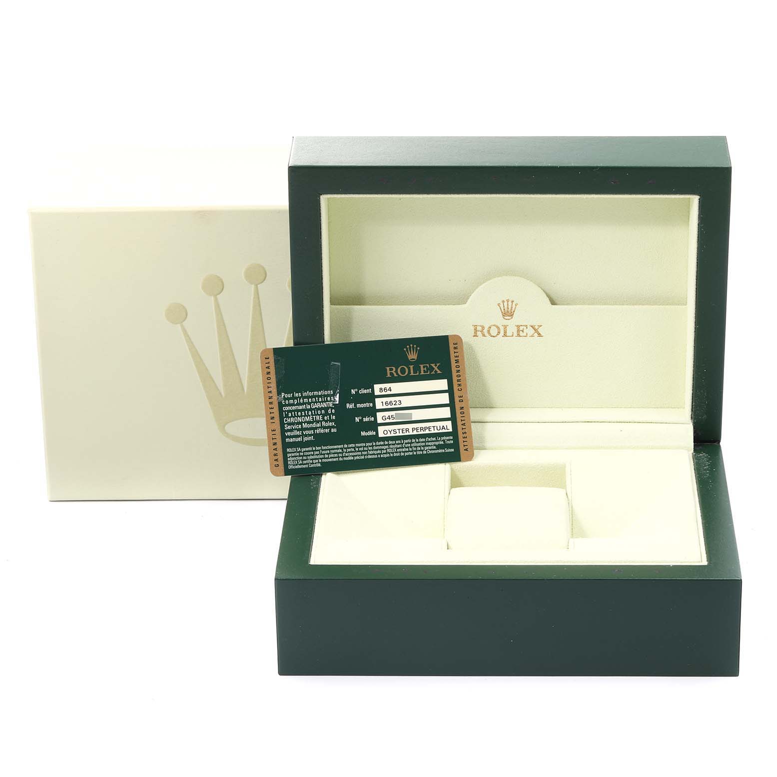 The image shows the Rolex Yacht-Master 16623 Men
s Steel and Gold (two tone) White Dial 16623 Men
s Steel and Gold (two tone) White Dial watch box and guarantee card at an angle.