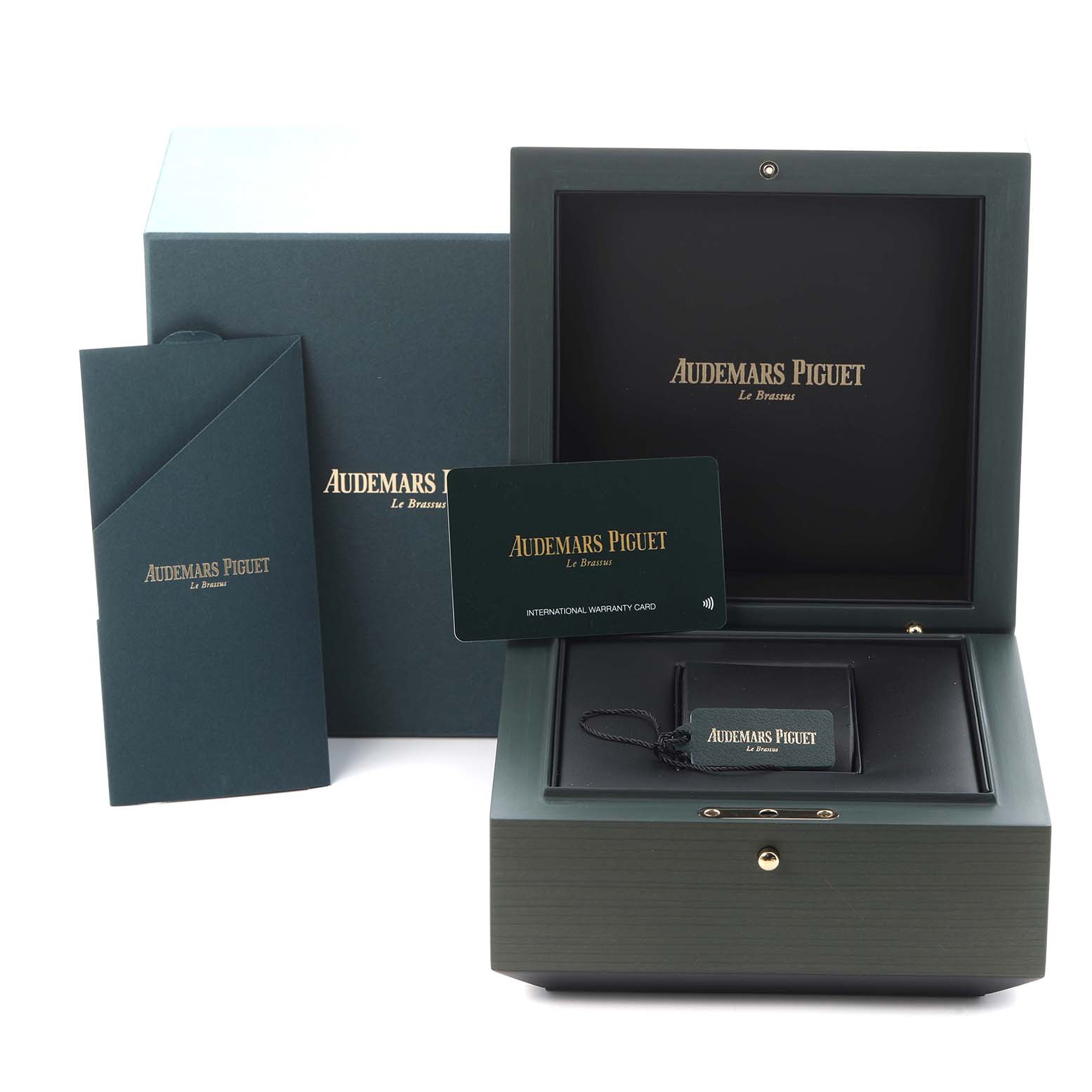 The image shows the Royal Oak by Audemars Piguet packaging, including a box, card, and envelope, from a front angle.
