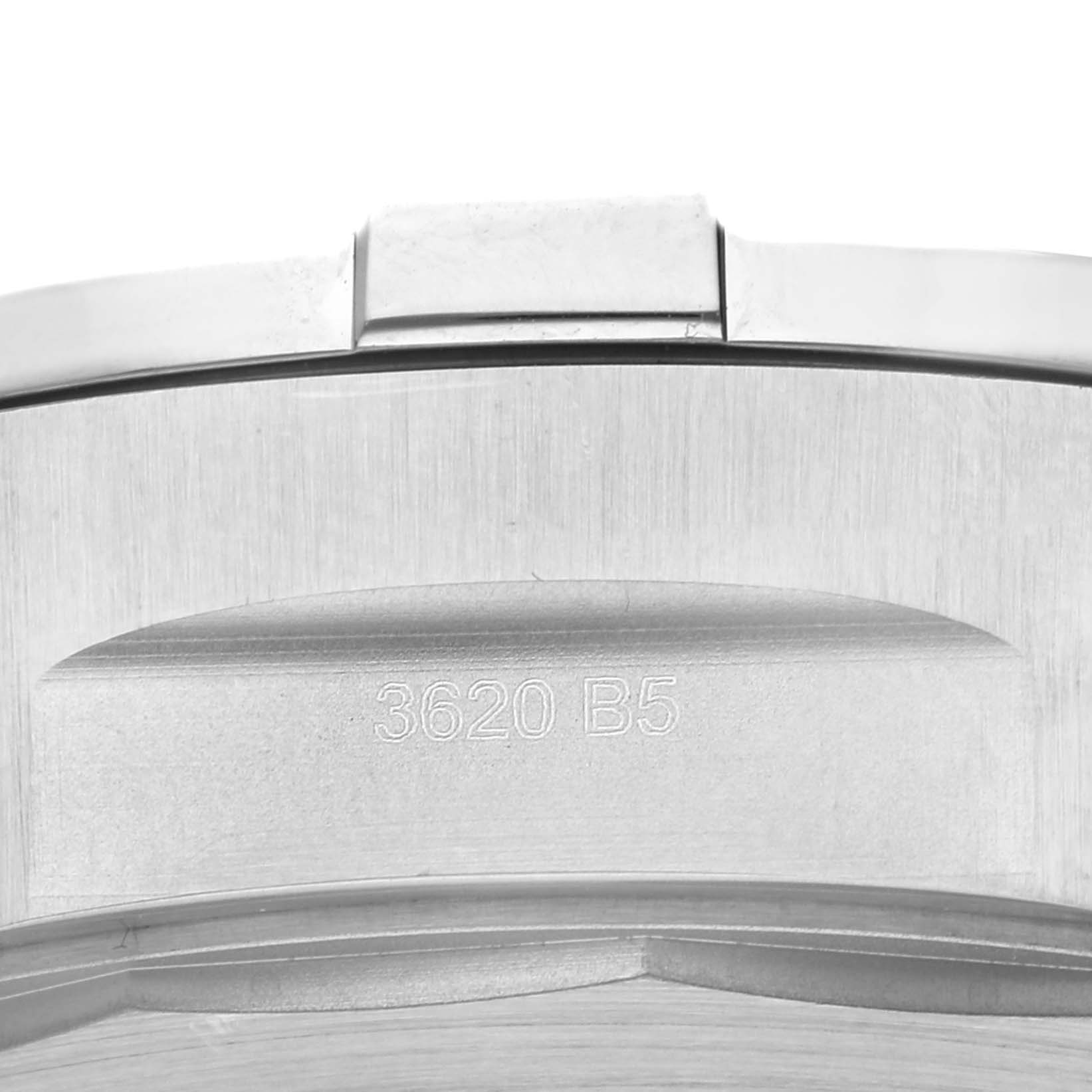 The image shows a close-up side view of the Breitling Avenger A13375 Men
s Stainless Steel Black Dial A13375 Men
s Stainless Steel Black Dial watch, highlighting the case and engraved markings.