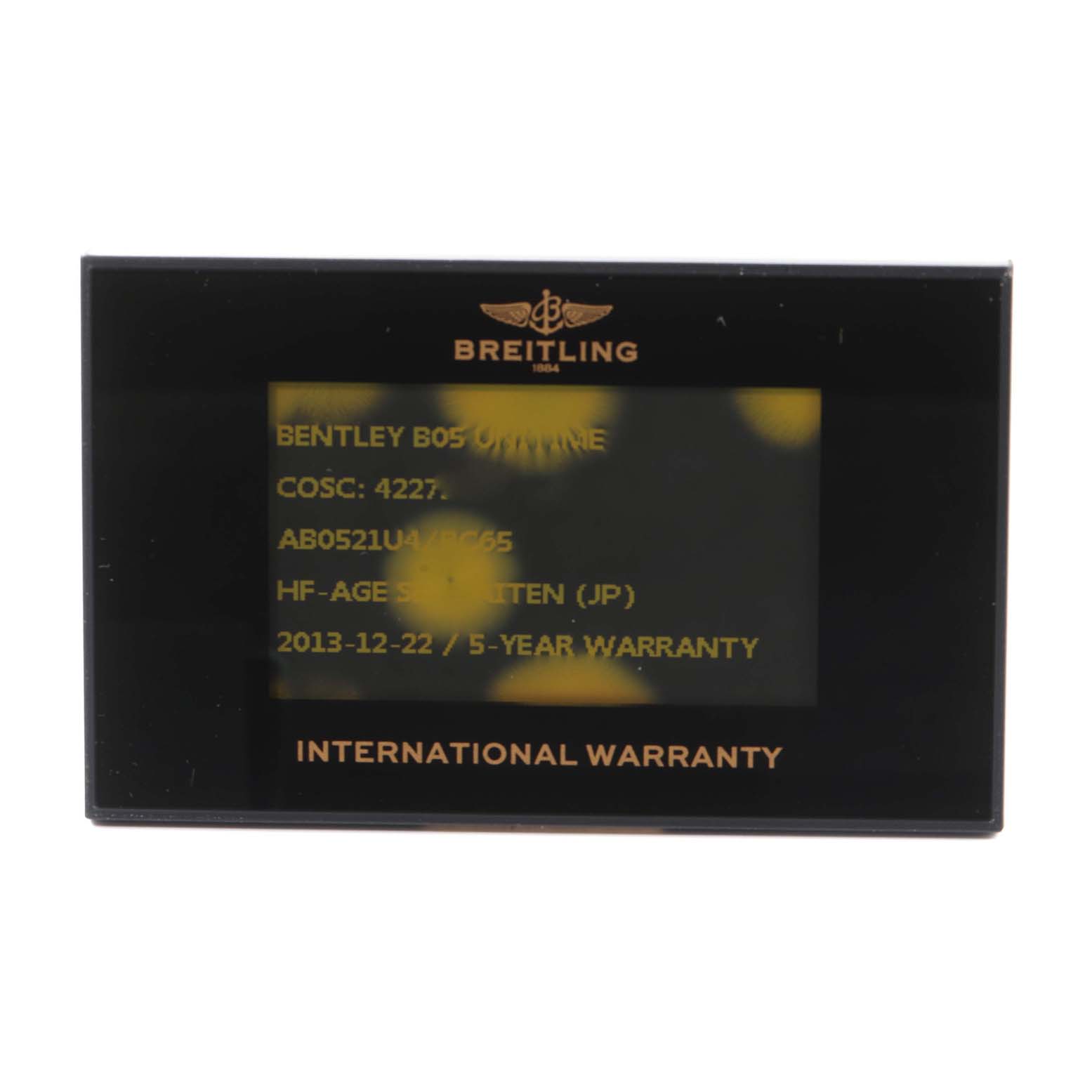 The image shows a Breitling Bentley AB0521U4/BC65 Men's Stainless Steel Black Dial AB0521U4/BC65 Men's Stainless Steel Black Dial B05 warranty card featuring the model details and warranty information.