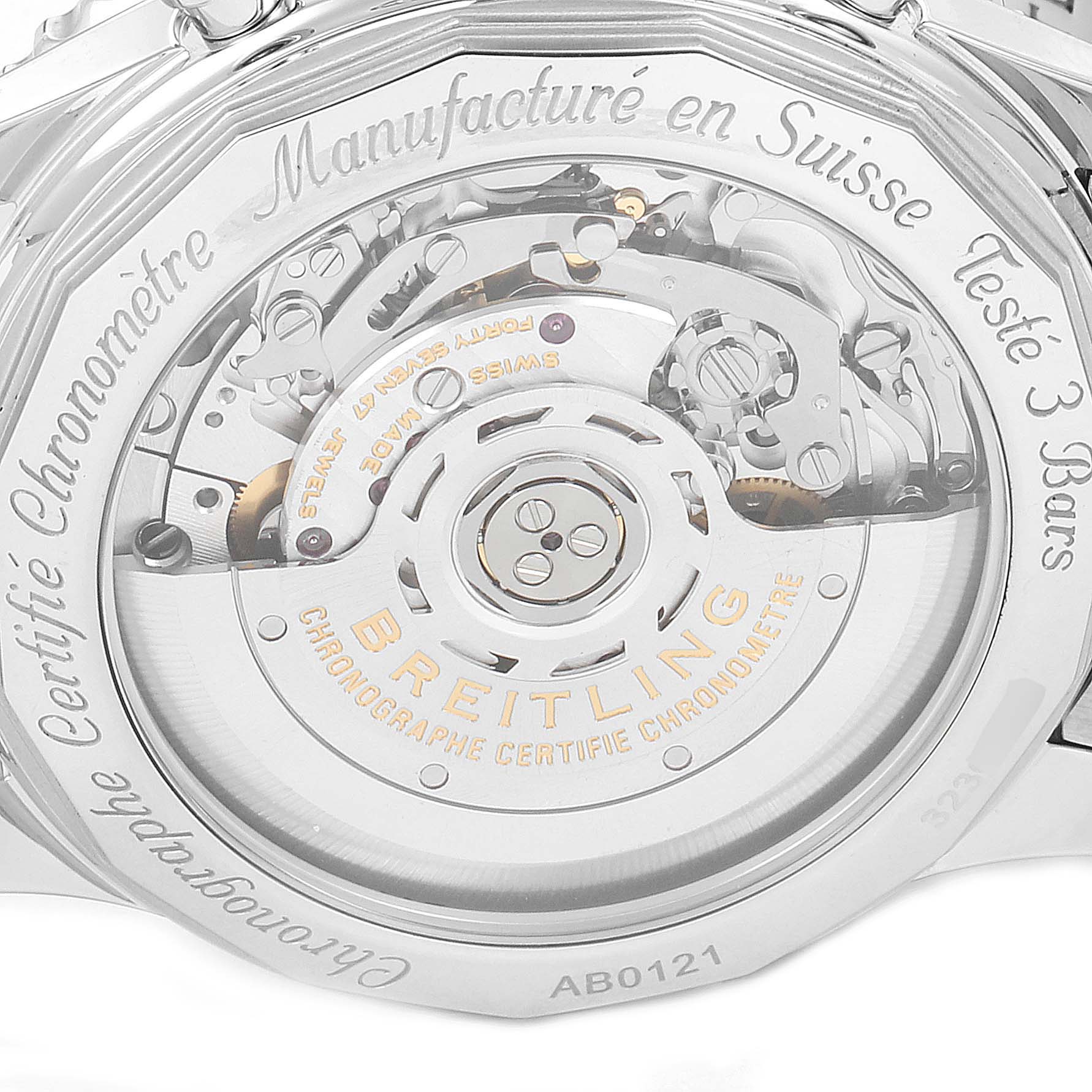 The image shows the back of the Breitling Navitimer AB0121 Men's Stainless Steel Blue Dial AB0121 Men's Stainless Steel Blue Dial watch, highlighting its movement and inscriptions on the case back.