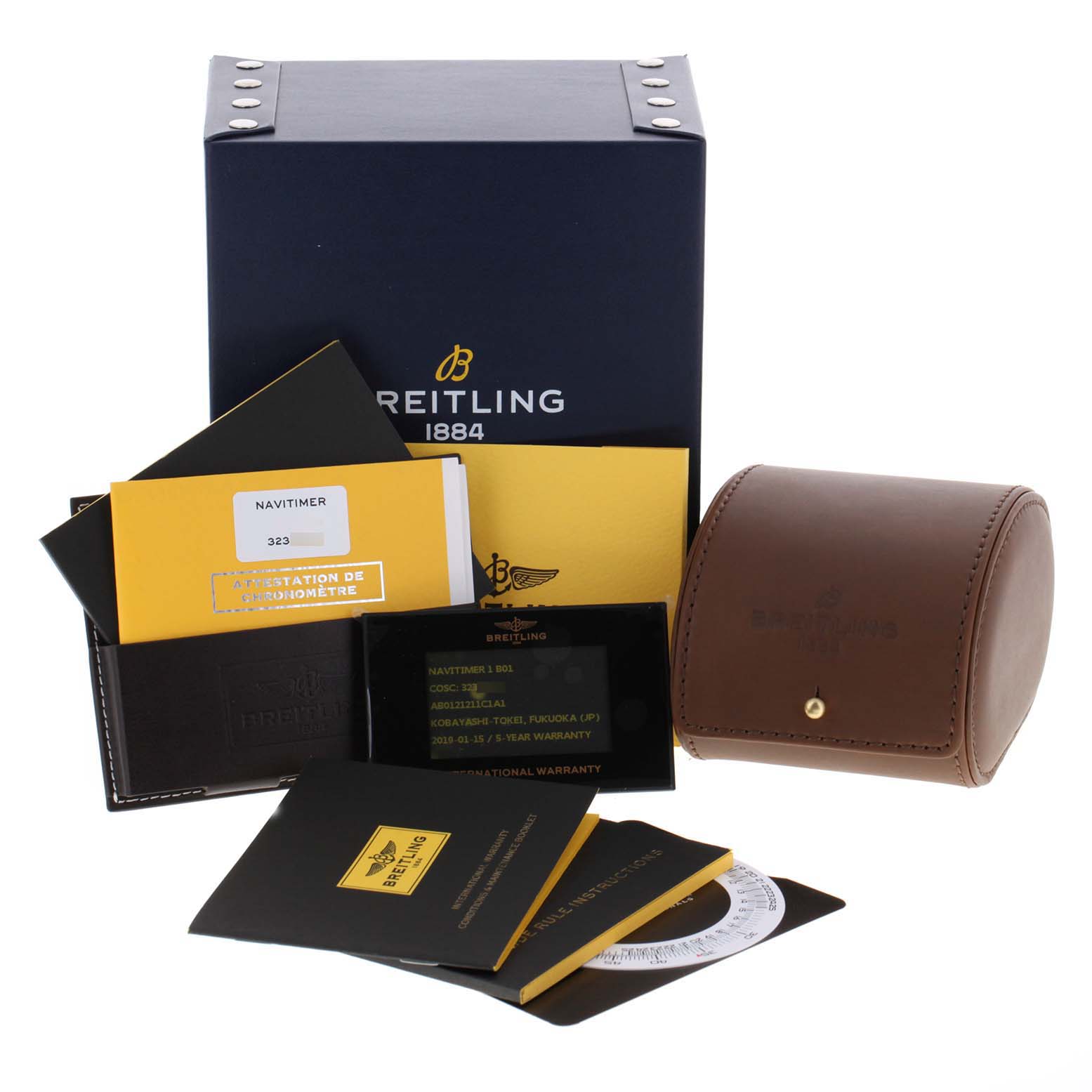 The image shows the packaging, booklets, warranty cards, and a leather case for a Breitling Navitimer AB0121 Men's Stainless Steel Blue Dial AB0121 Men's Stainless Steel Blue Dial watch.