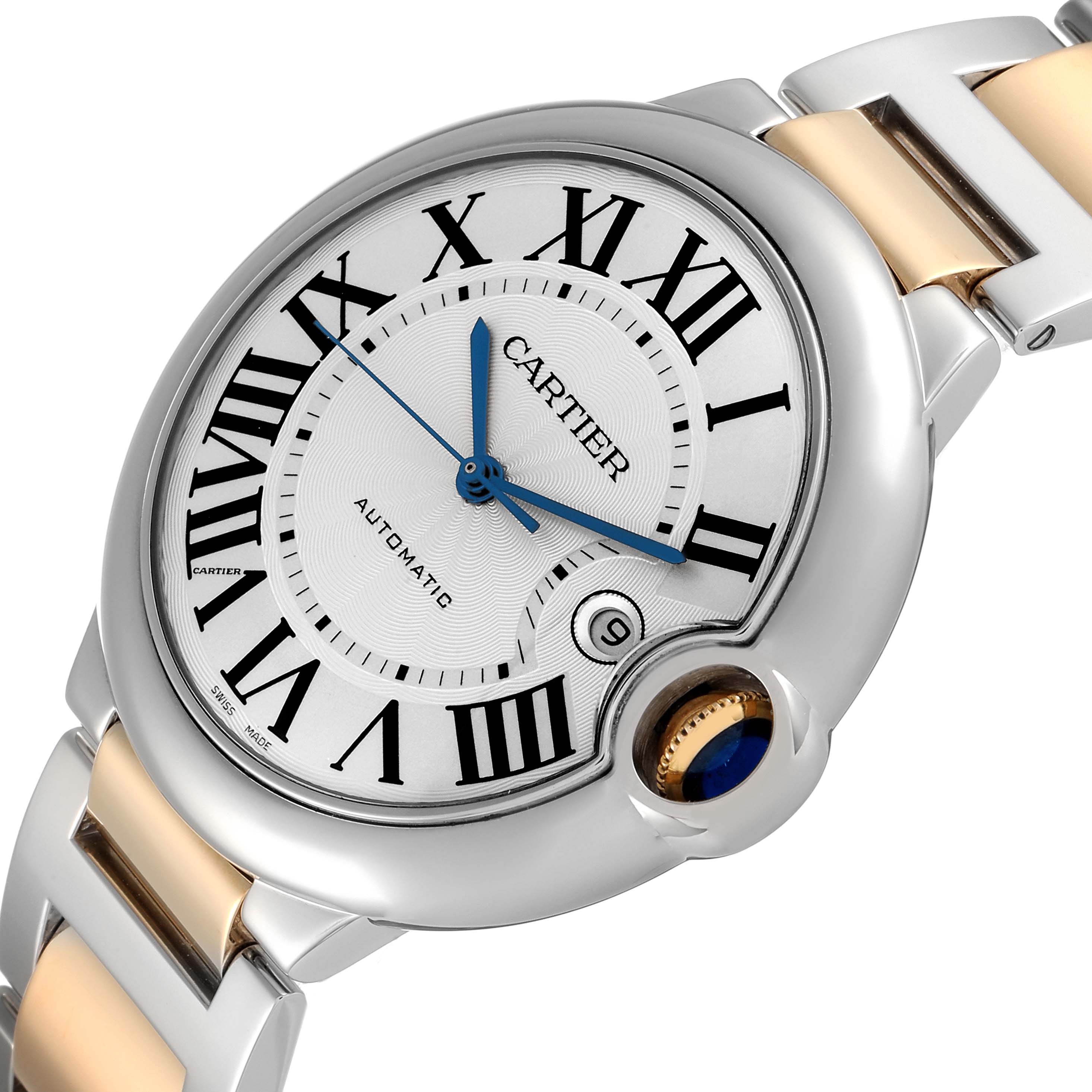 The image shows a close-up view of the Cartier Ballon Bleu W69009Z3 Men's Steel and Gold (two tone) Silver Dial W69009Z3 Men's Steel and Gold (two tone) Silver Dial watch, highlighting the dial, Roman numerals, and bracelet.