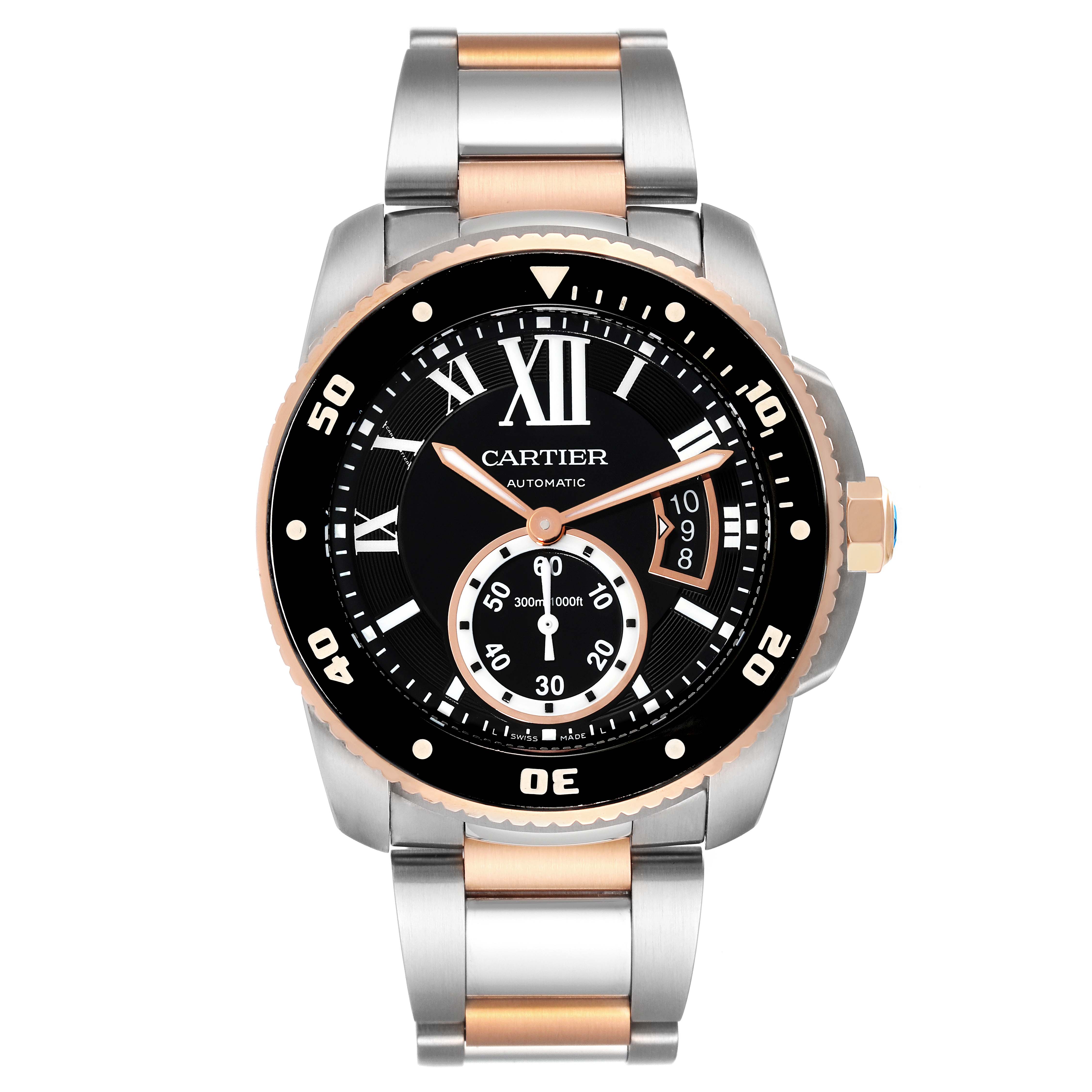 The Calibre de Cartier watch is shown from a top-down angle, highlighting its face and two-tone metal band.