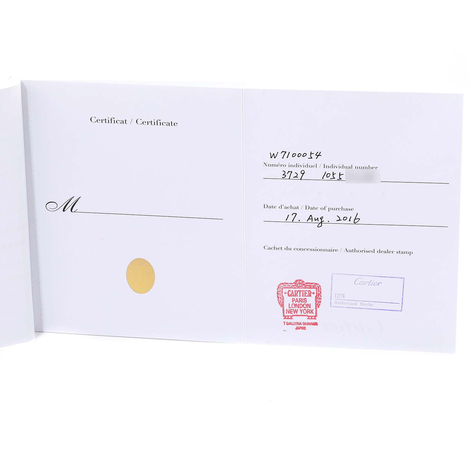 The image shows an open certificate booklet for a Calibre de Cartier watch by Cartier, displaying purchase details and dealer stamp.