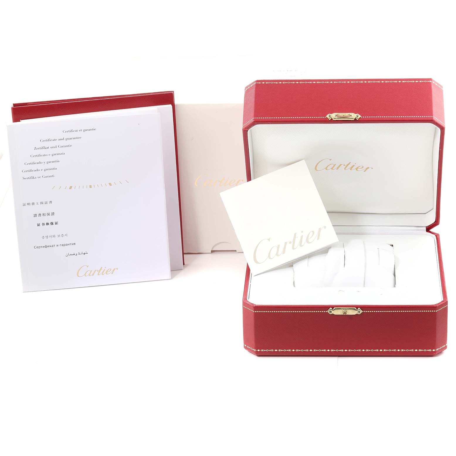 The image shows the packaging and accessories for a Calibre de Cartier watch by Cartier, including a red watch box and warranty documents.