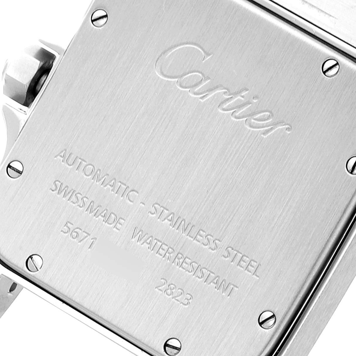 This image shows the back casing of a Cartier Santos W20098D6 Men
s Stainless Steel Silver Dial W20098D6 Men
s Stainless Steel Silver Dial watch, highlighting the brand
s engraved details and screws.