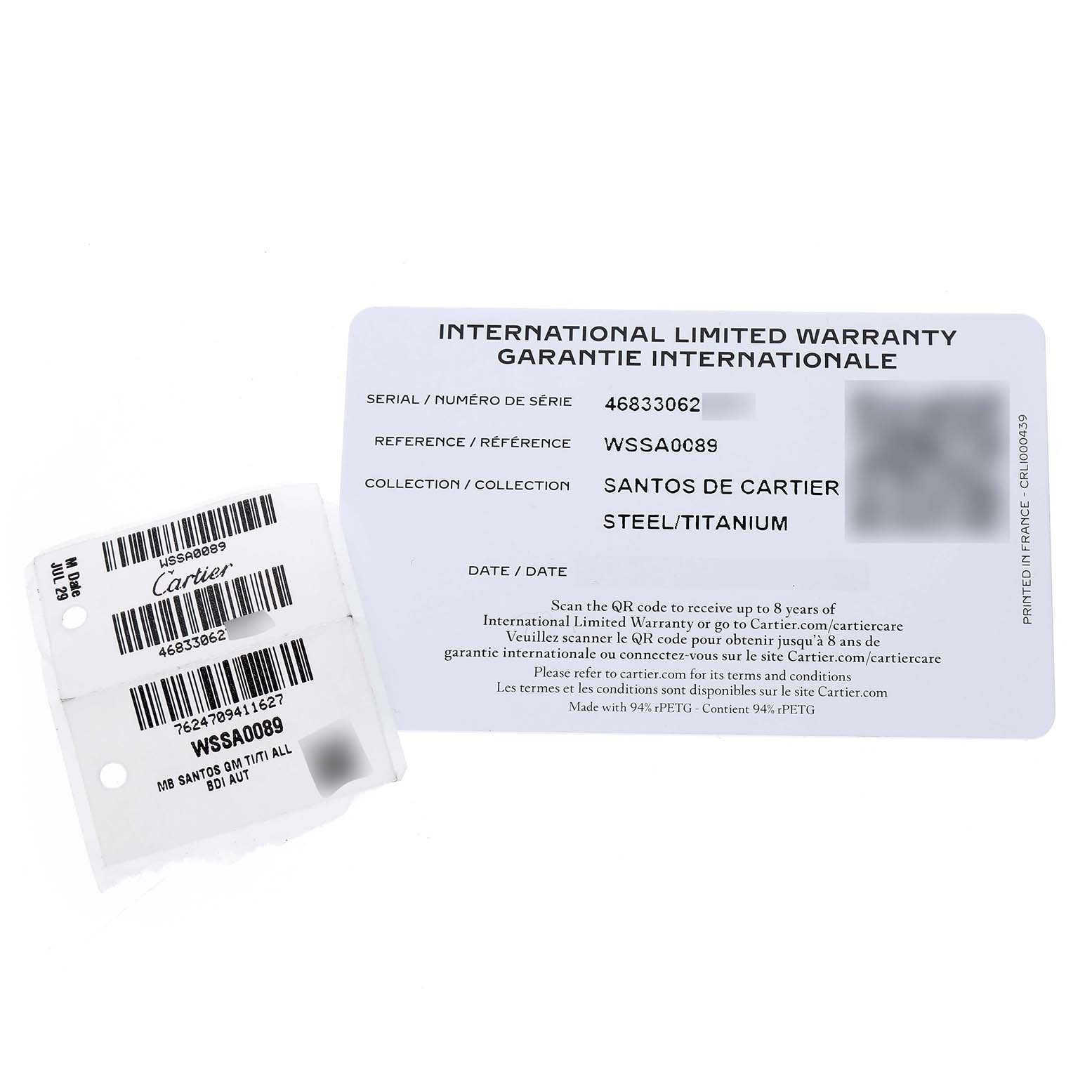 The image shows the International Limited Warranty card and a tag for the Santos de Cartier watch.