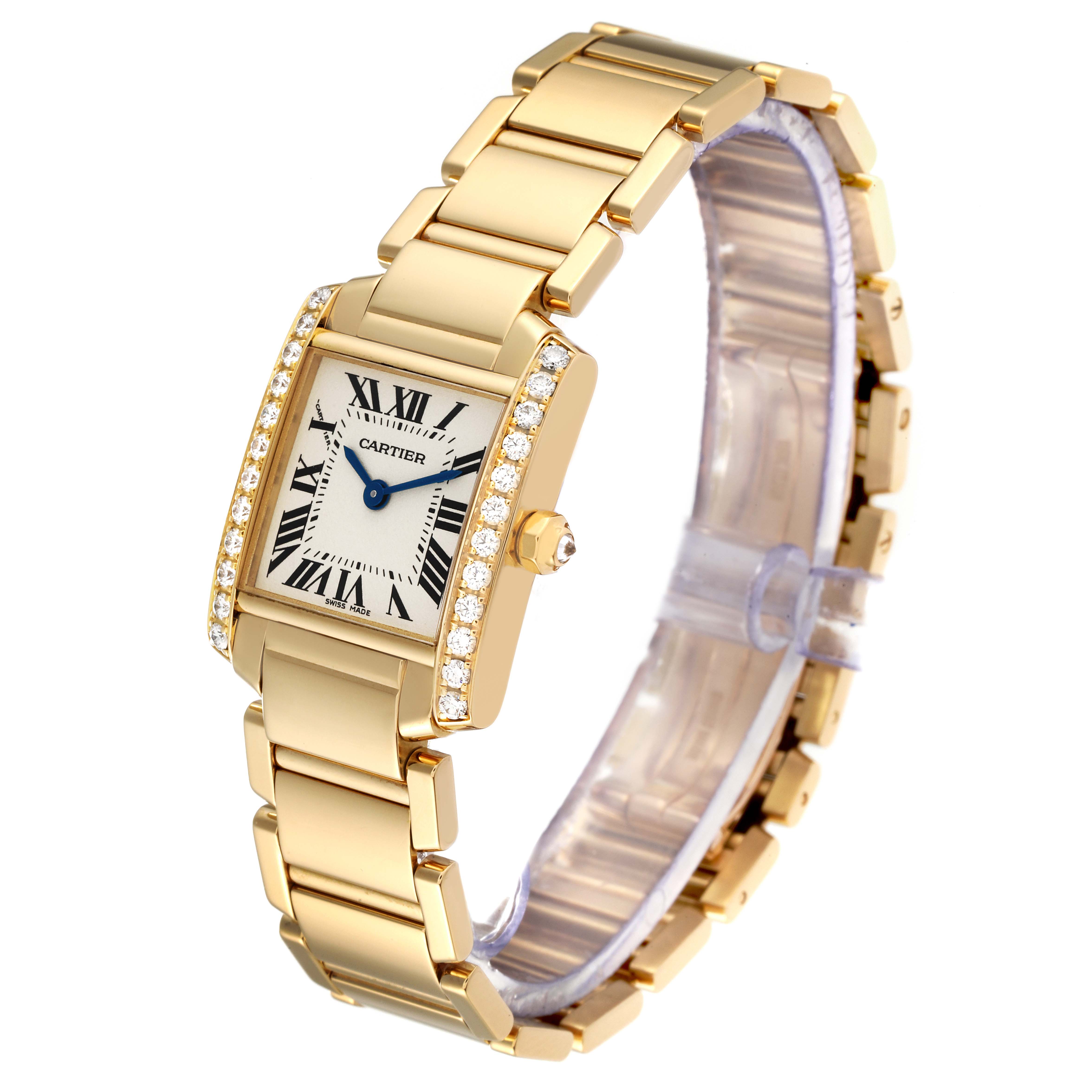 The image shows a Cartier Tank Française watch angled to display the face, bracelet, and diamond-set bezel.