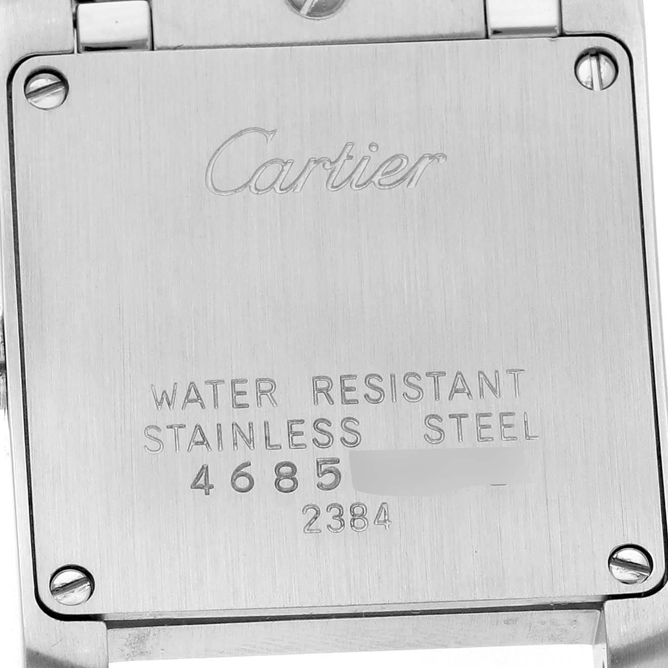 The image shows the back case of the Cartier Tank Francaise W51027Q4 Women's Stainless Steel Mother of Pearl Dial watch, highlighting its stainless steel composition and water resistance.