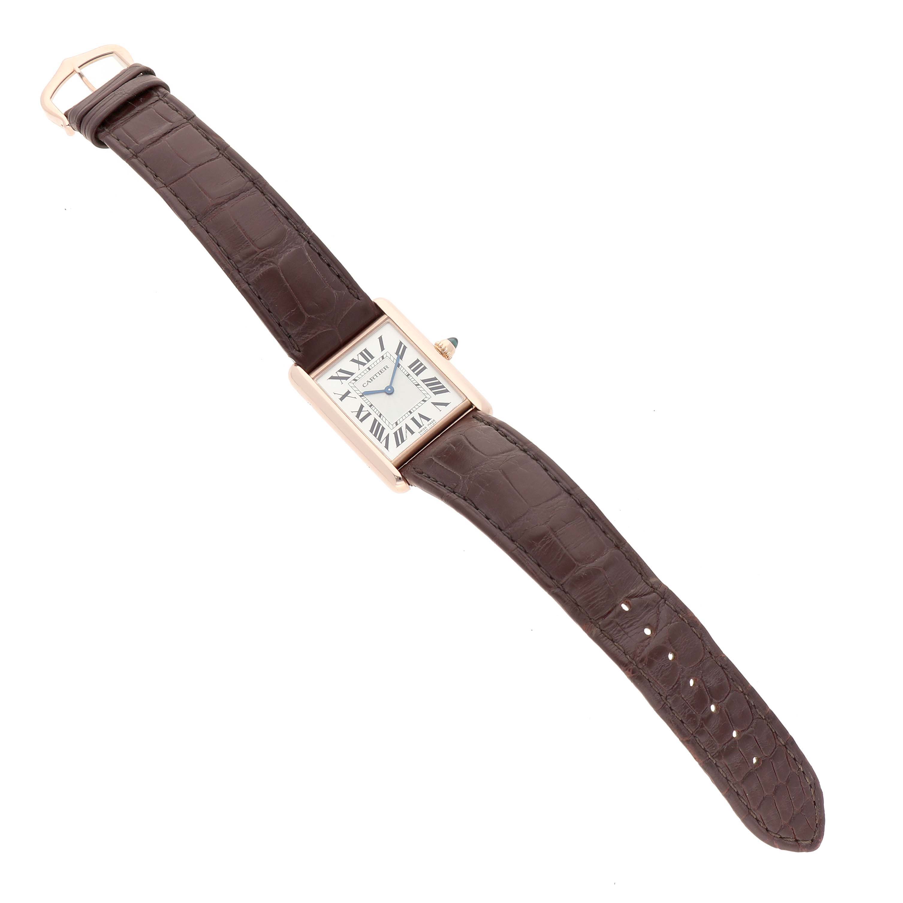 The Cartier Tank Louis WGTA0011 Men's Rose Gold Silver Dial watch is displayed from a top-down angle, showing the face, bezel, crown, and leather strap.